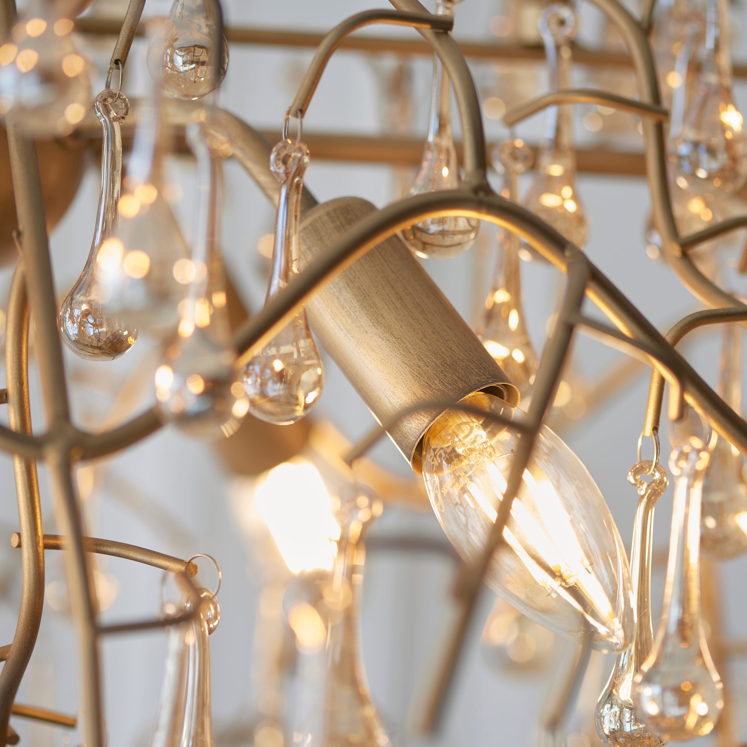 Utopia Drip 6 Light Linear Chandelier - Aged Gold Paint & Champagne Lustre Glass