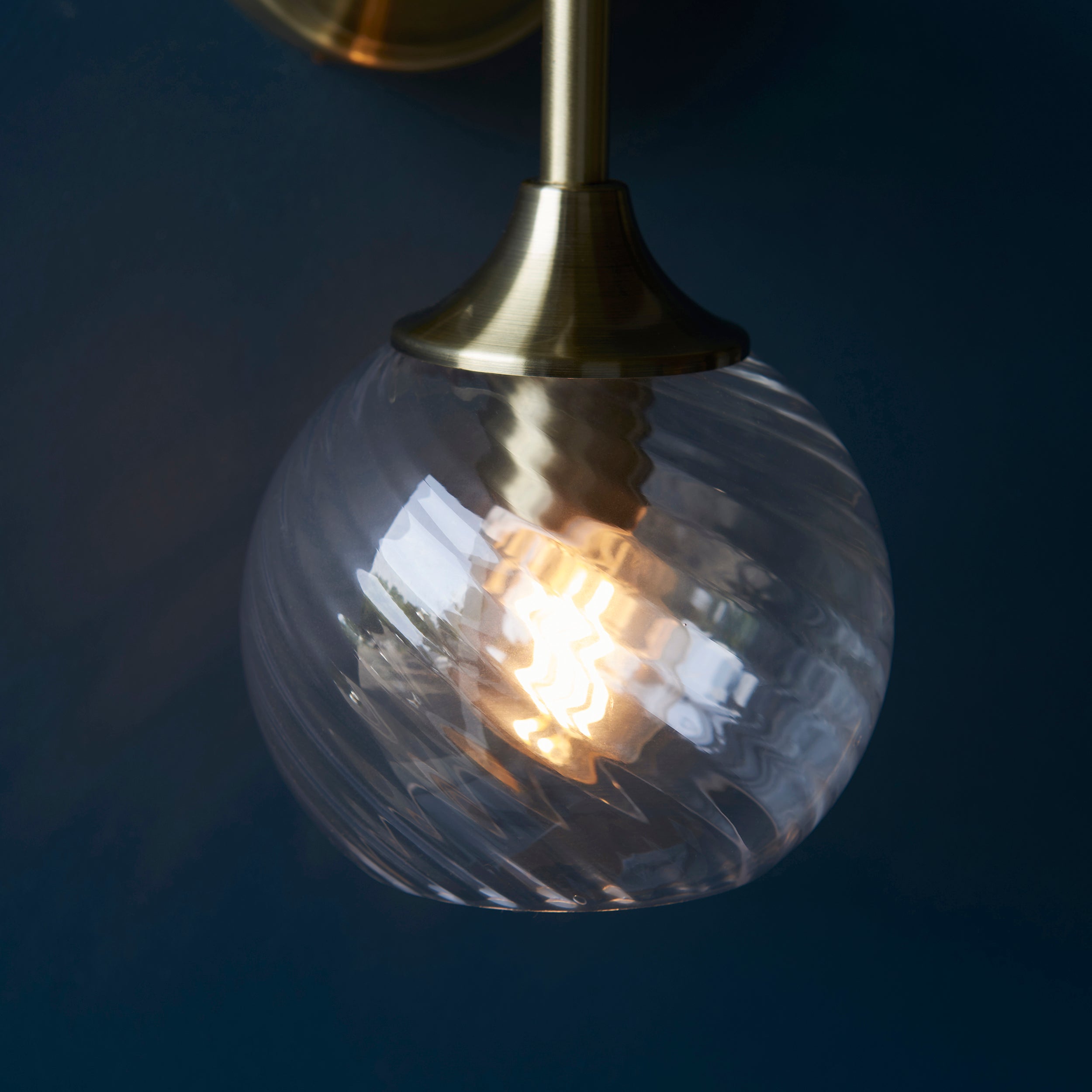 Endon Allegra Single Wall Light - Antique Brass Plate & Clear Spiral Glass