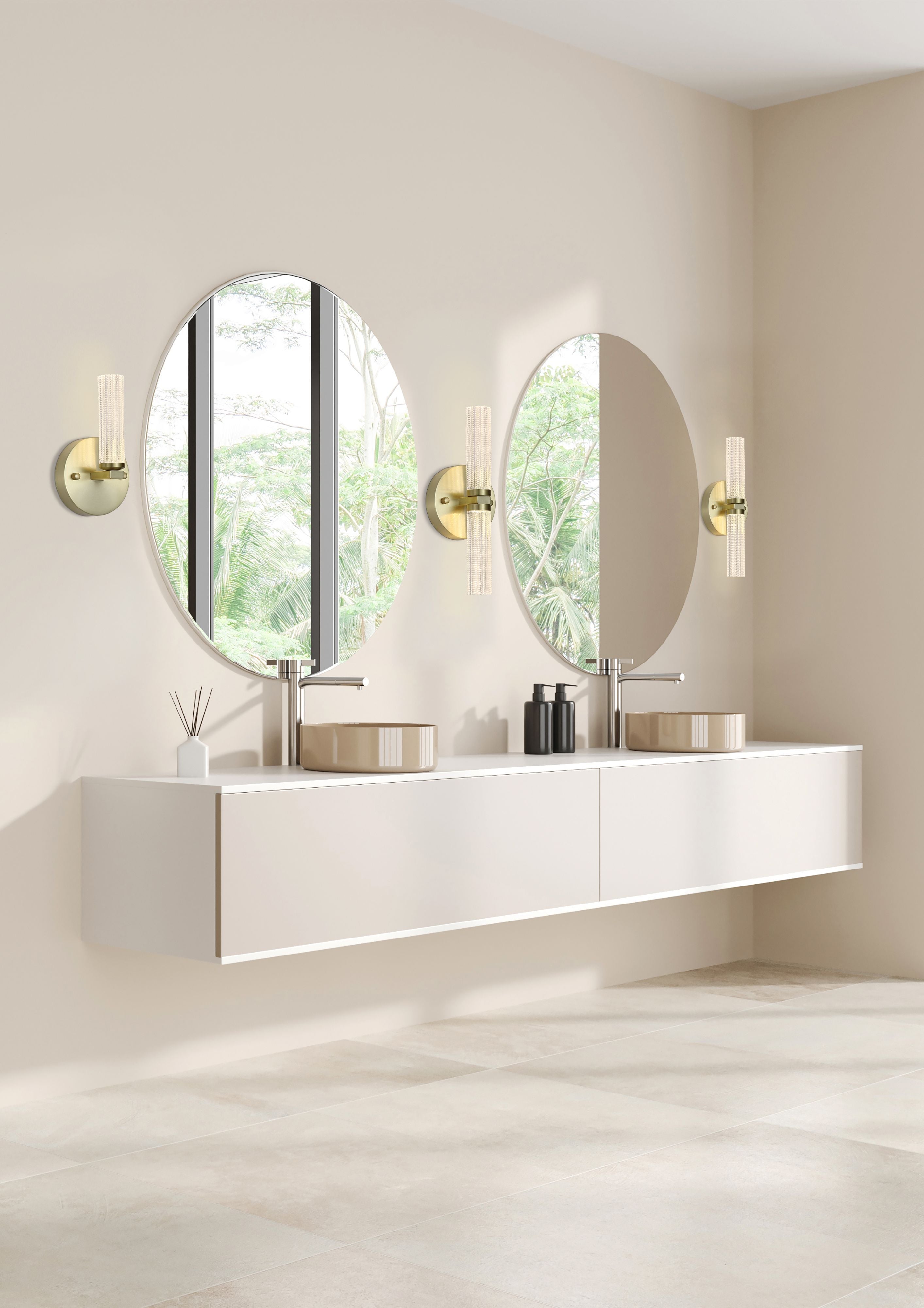 Three Searchlight Aberdeen wall lights in satin brass mounted beside oval mirrors above countertop basins in a bathroom