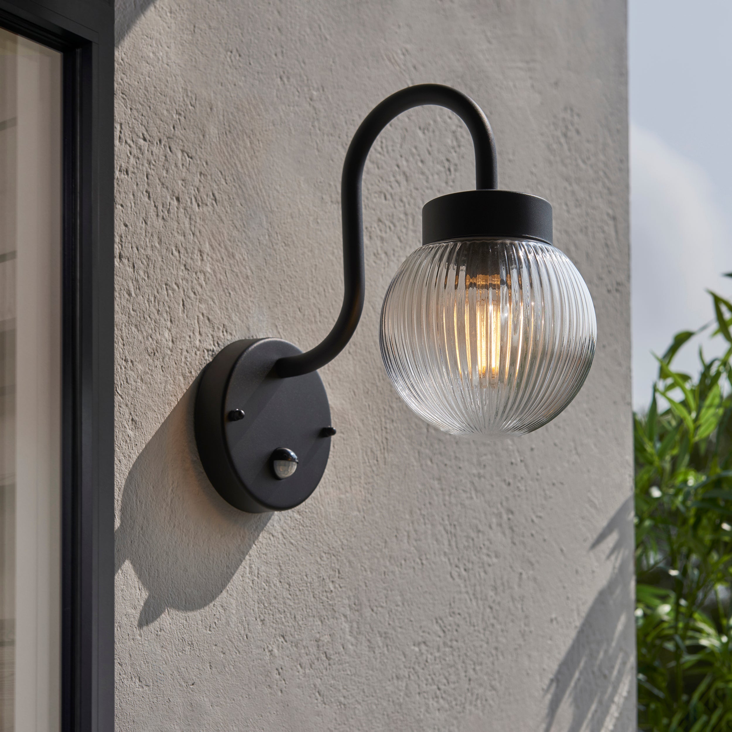Endon Eldon Single Wall Light with PIR - Textured Black & Clear Ribbed Glass