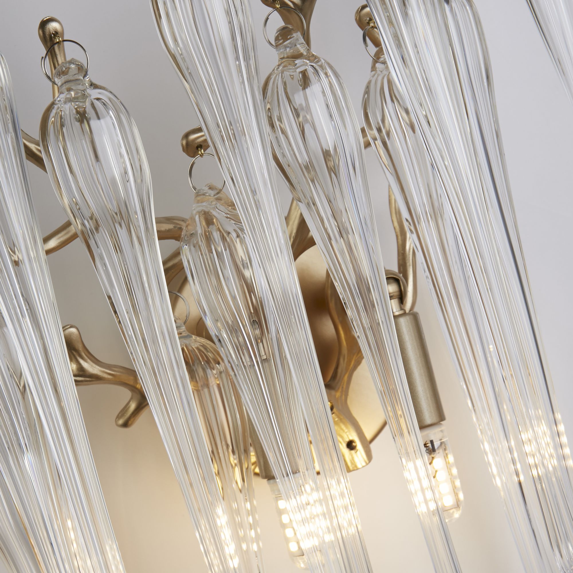 Close up of the gold branch frame and glass drops on the Searchlight Heritage 2 light wall light, showing the G9 bulb fittings