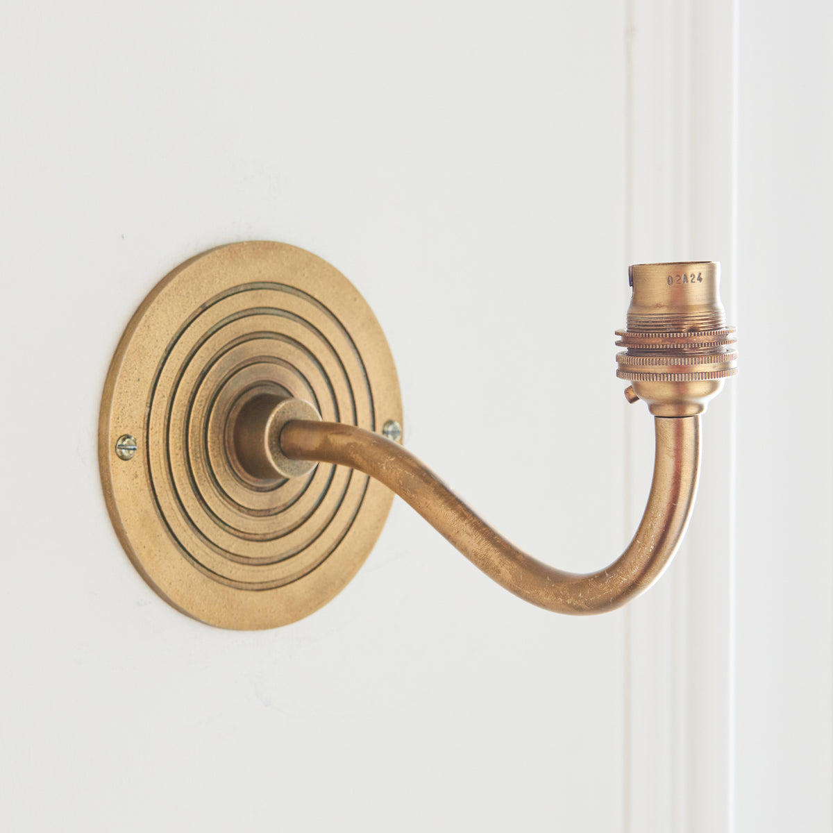 Endon Ripple Curve Wall Fitting - Antique Brass Plate