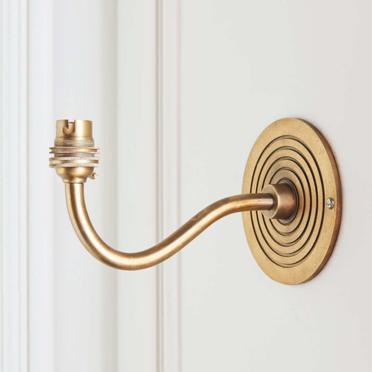 Endon Ripple Curve Wall Fitting - Antique Brass Plate