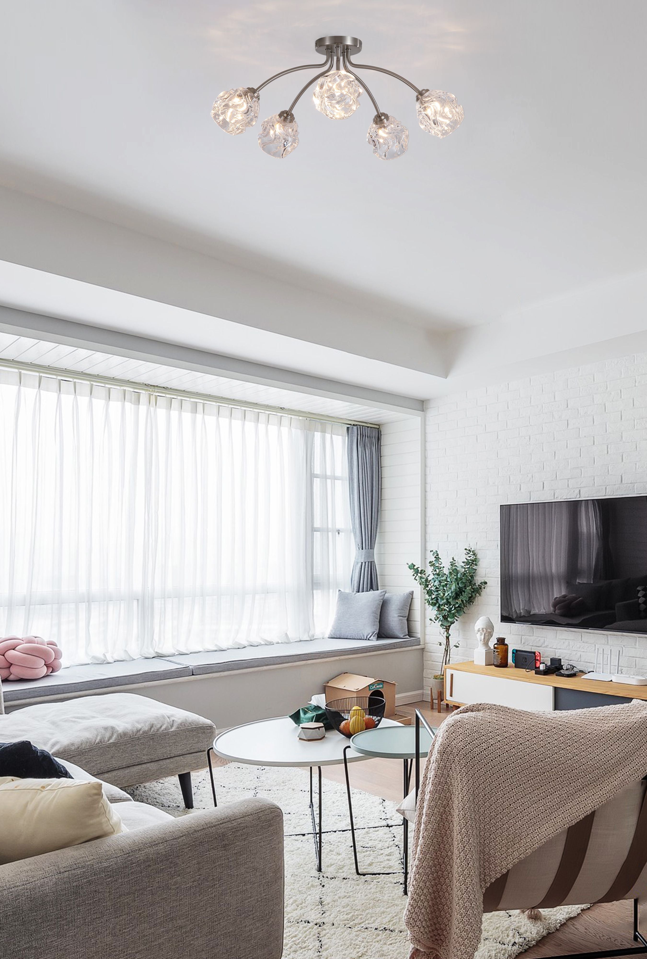 Searchlight Astral 5 Light Flush in satin nickel styled in a living room above a sofa and coffee table