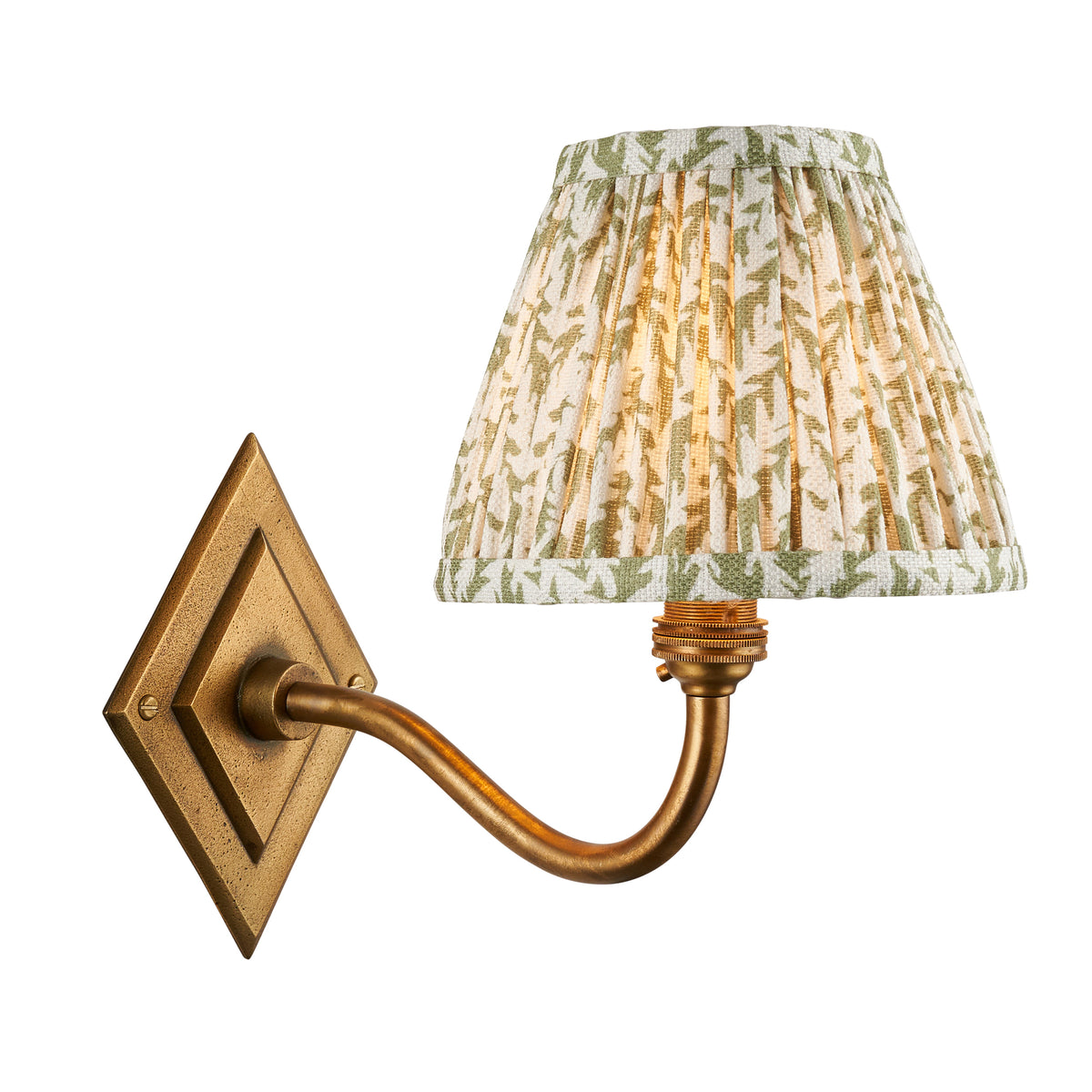 Endon Diamond Curve wall light in antique brass with a lit 16cm herb garden green leaf print pleated shade, cut out on white