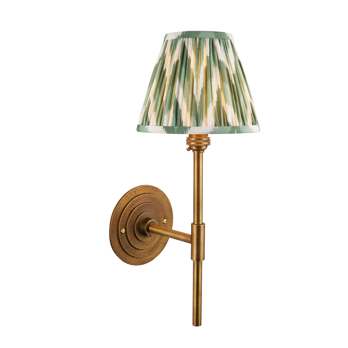 Endon Halo Tall wall light in antique brass with a green and white zigzag pleated shade, unlit, cut out on white