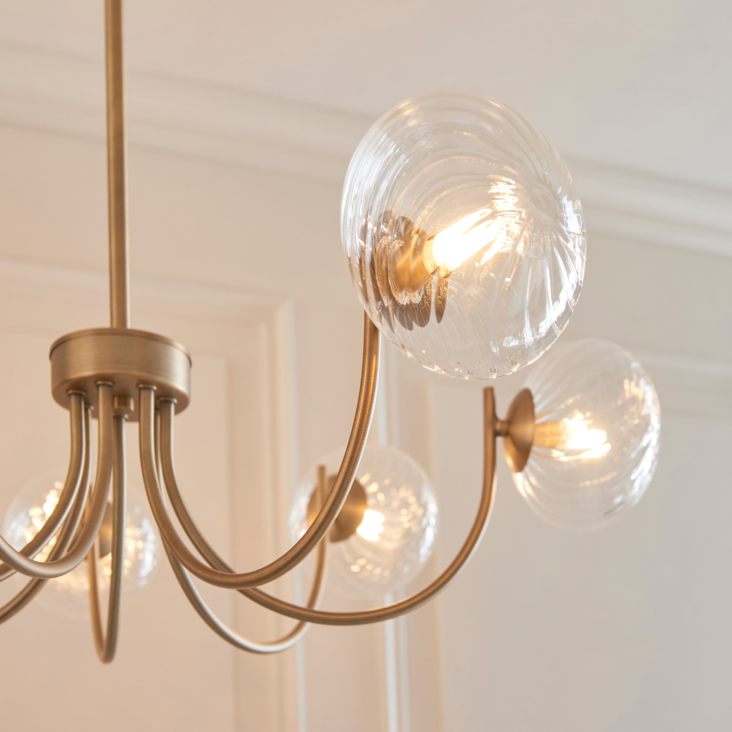 Endon Hague 7 Light Pendant - Warm Antique Brass Plate & Clear Spiral Glass