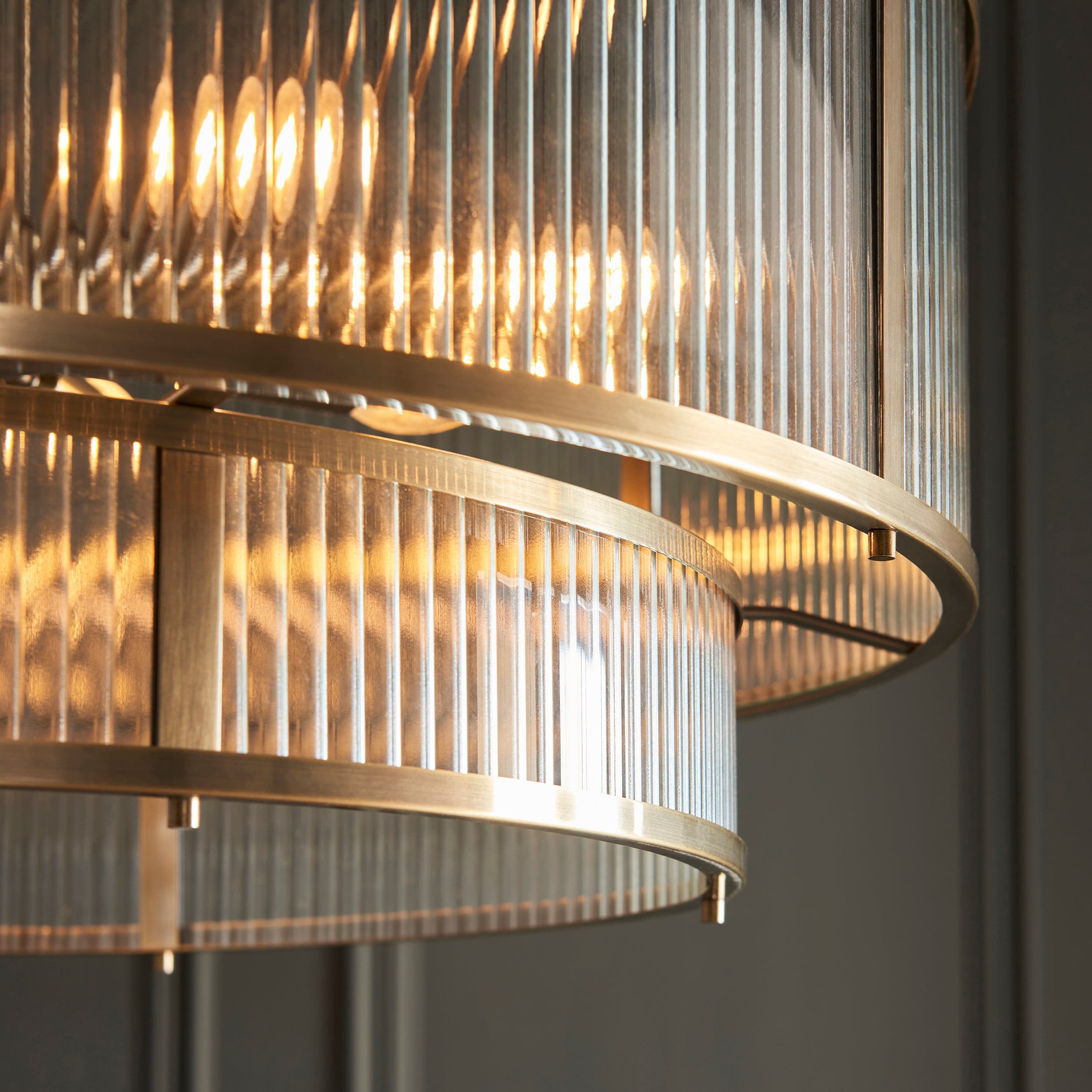 Endon Ridgeton 8 Light Tiered Pendant - Antique Brass Plate & Clear Ribbed Glass