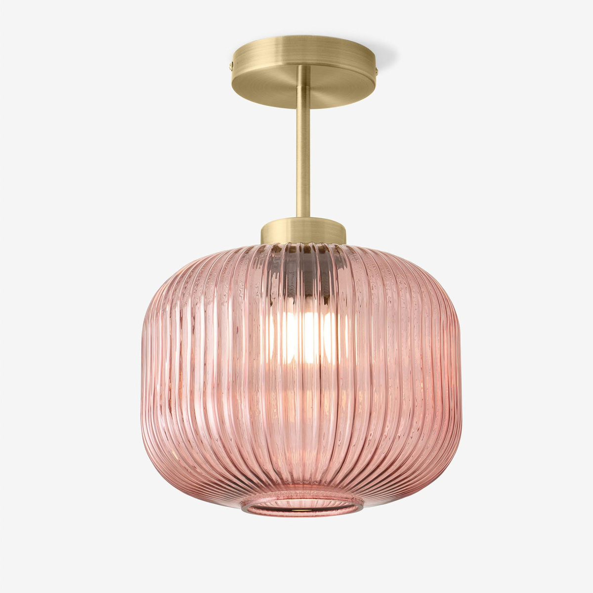 MADE.COM Briz flush ceiling light in antique brass with ribbed pink glass shade, studio shot from below