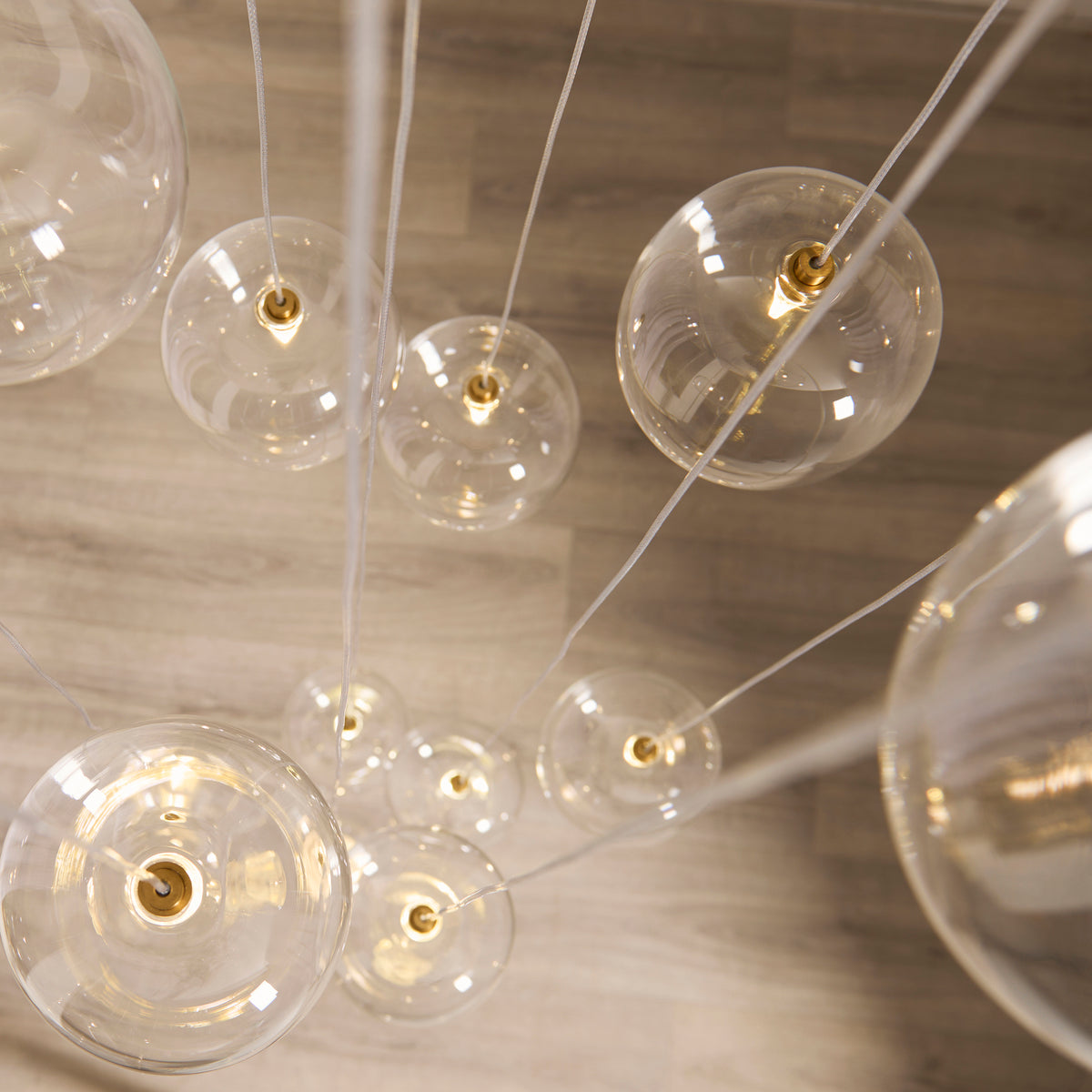 Endon Oslo 12 Light Cascade Pendant - Brushed Aged Brass Plate & Clear Glass