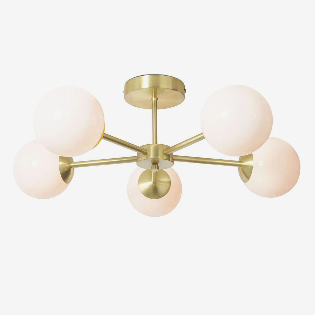 MADE Globe 5 light flush ceiling light in brushed brass with opal globes, studio shot