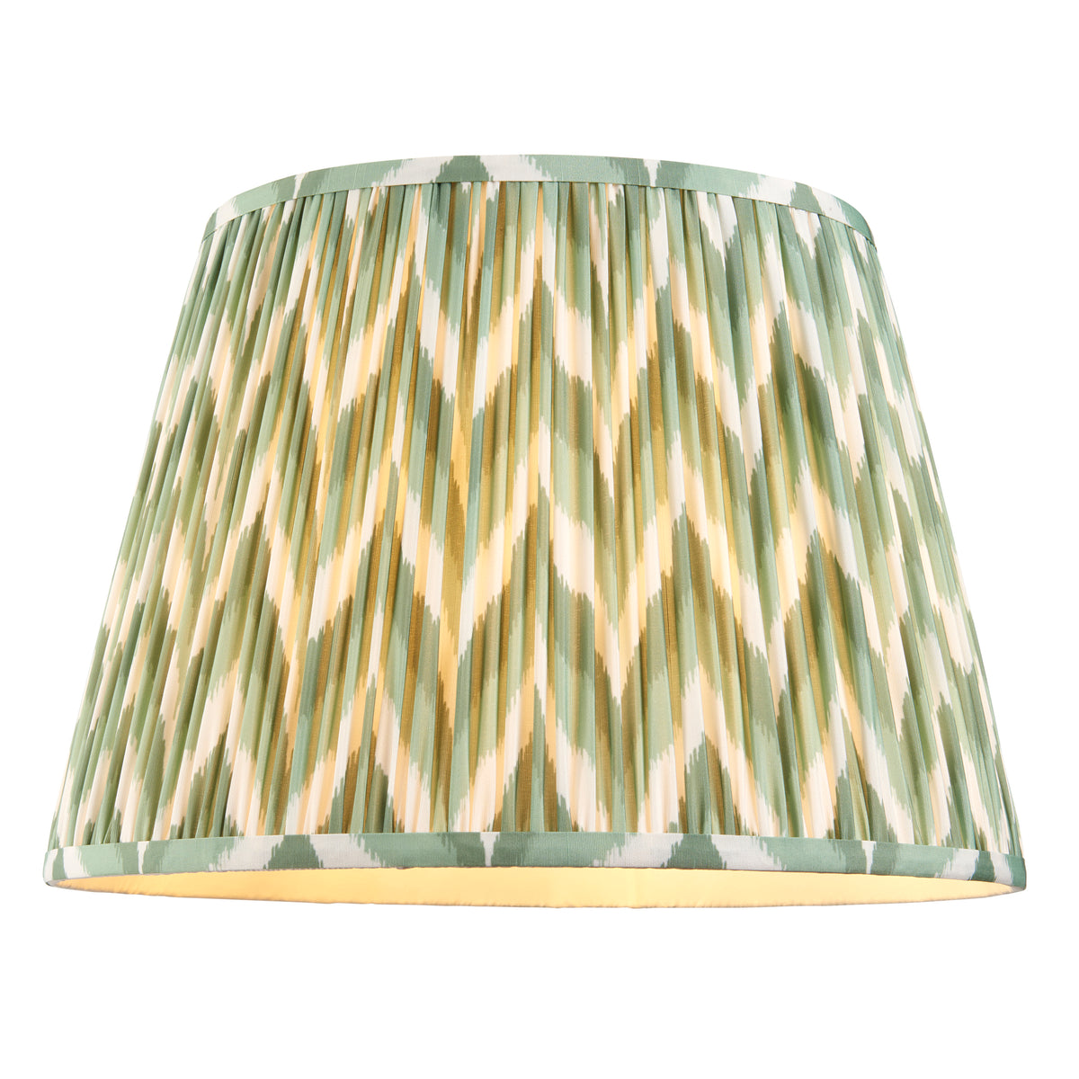 Endon ZigZag 40cm pleated faux silk lamp shade in Cotswold green shown lit on its own against a white background