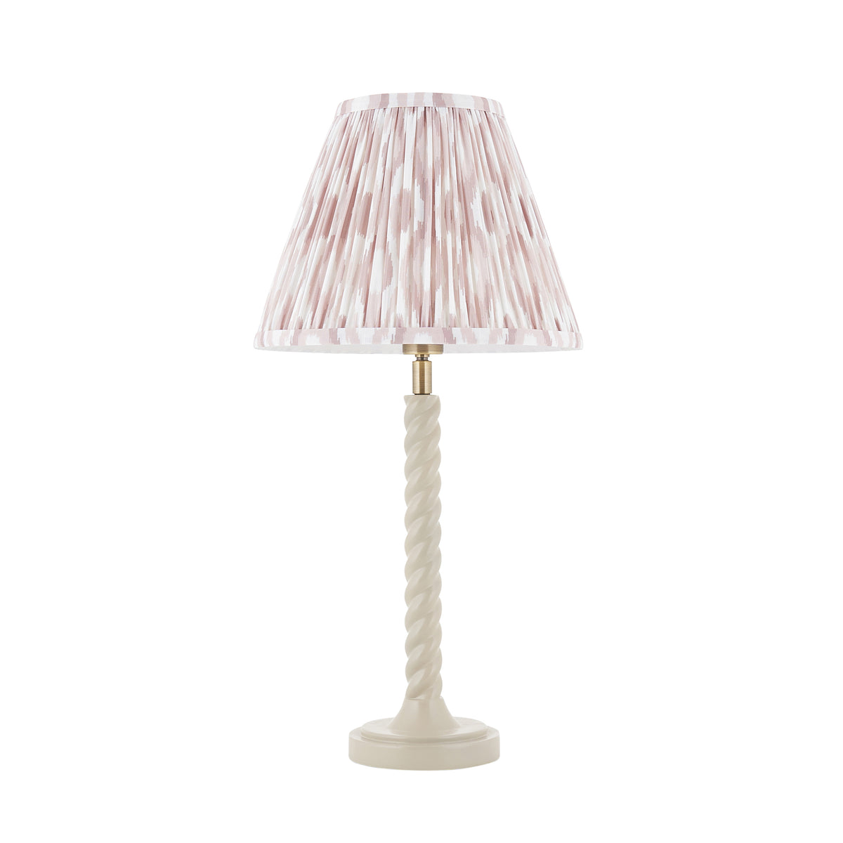 Endon Twist table lamp unlit, cut out on white, satin almond white barley twist stem with a neutral blush ikat pleated shade