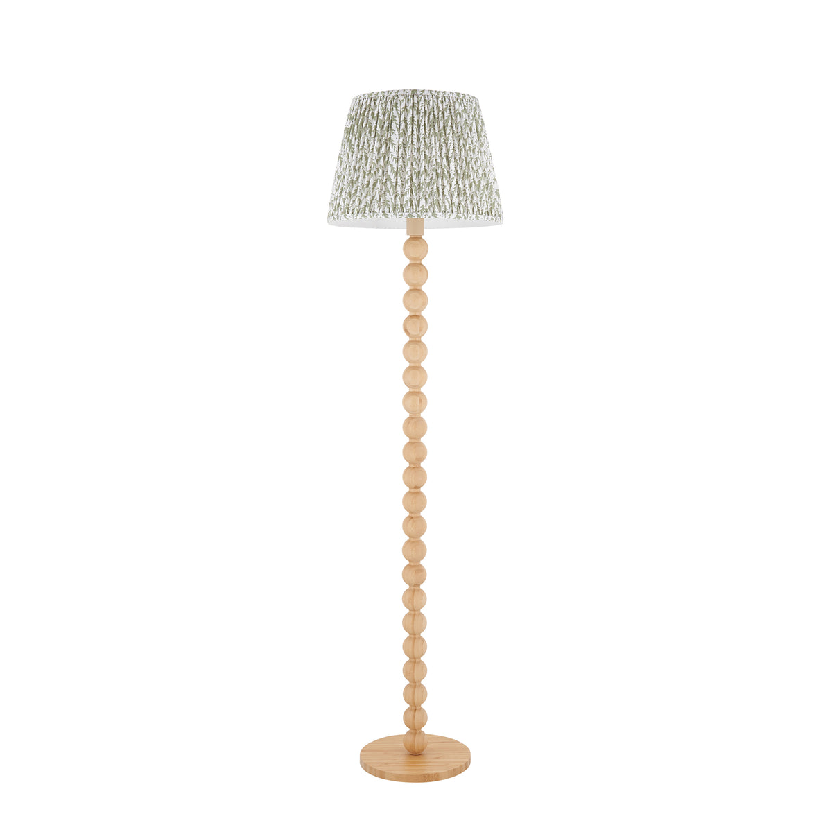 Endon Cane floor lamp unlit, cut out on white, stacked natural bamboo spheres on a round base with the green leaf print pleated shade