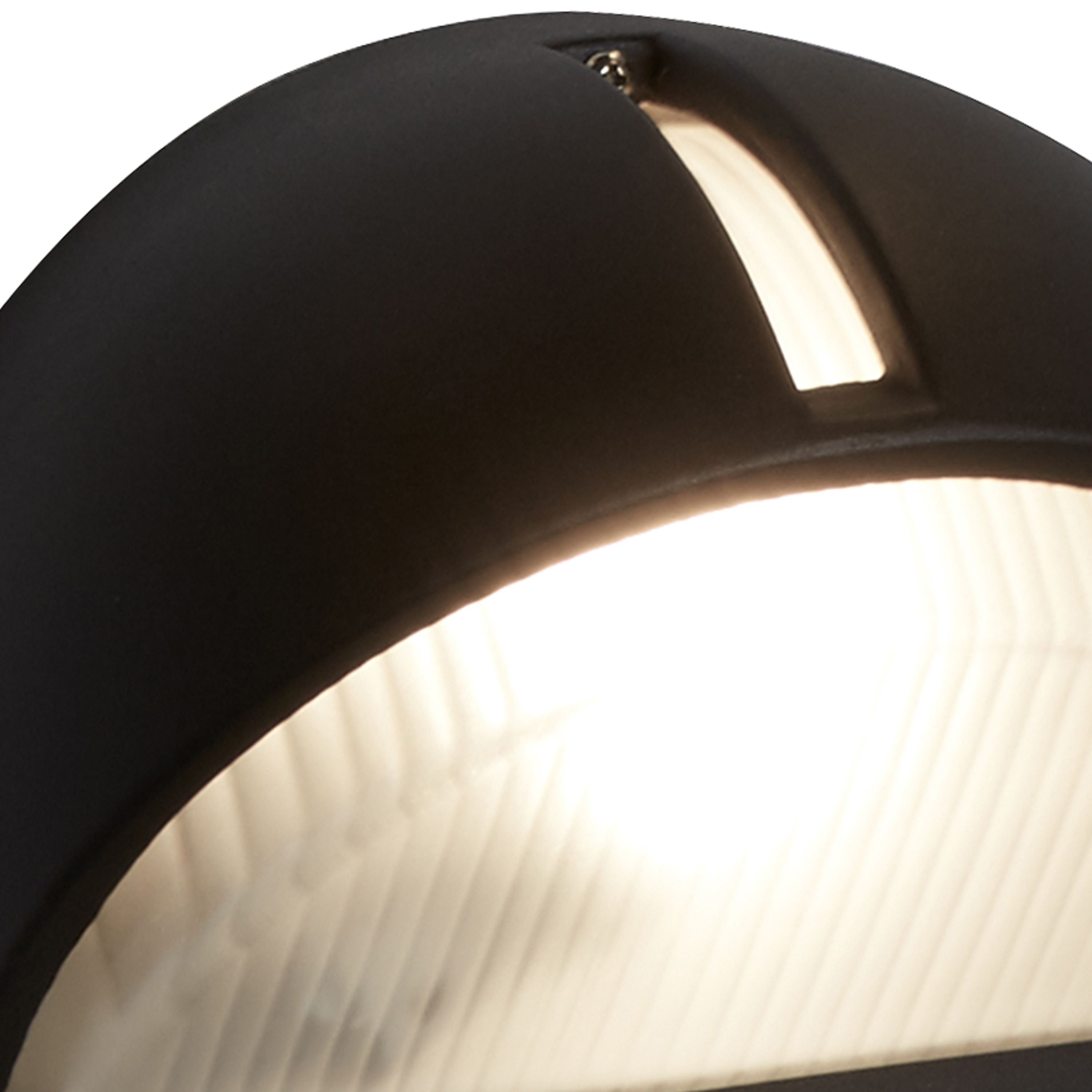 Extreme close up of the Kentucky wall light's cutaway light strip and mounting screws at the top edge