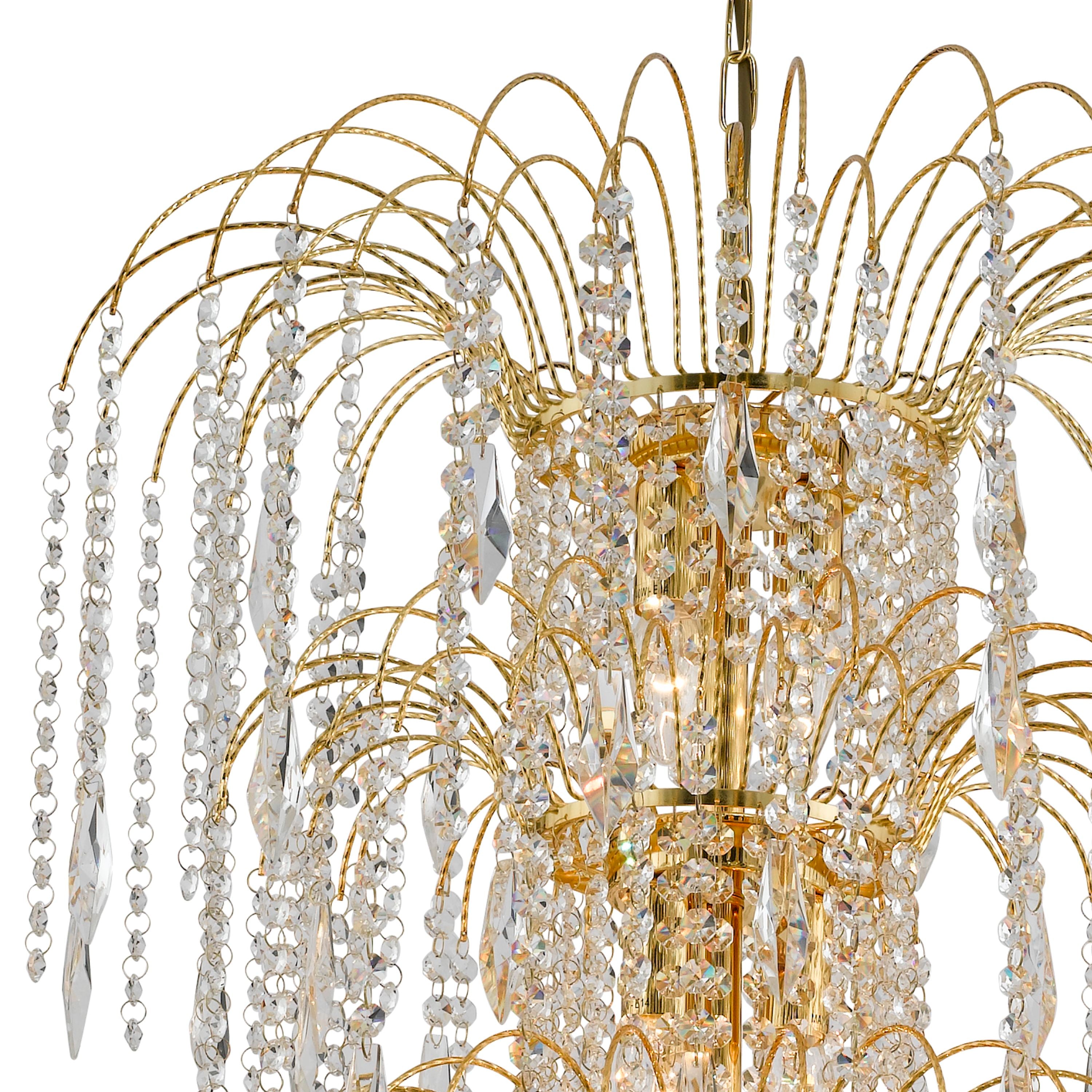 Close up of the gold arms and crystal beads on the Waterfall chandelier's top tier