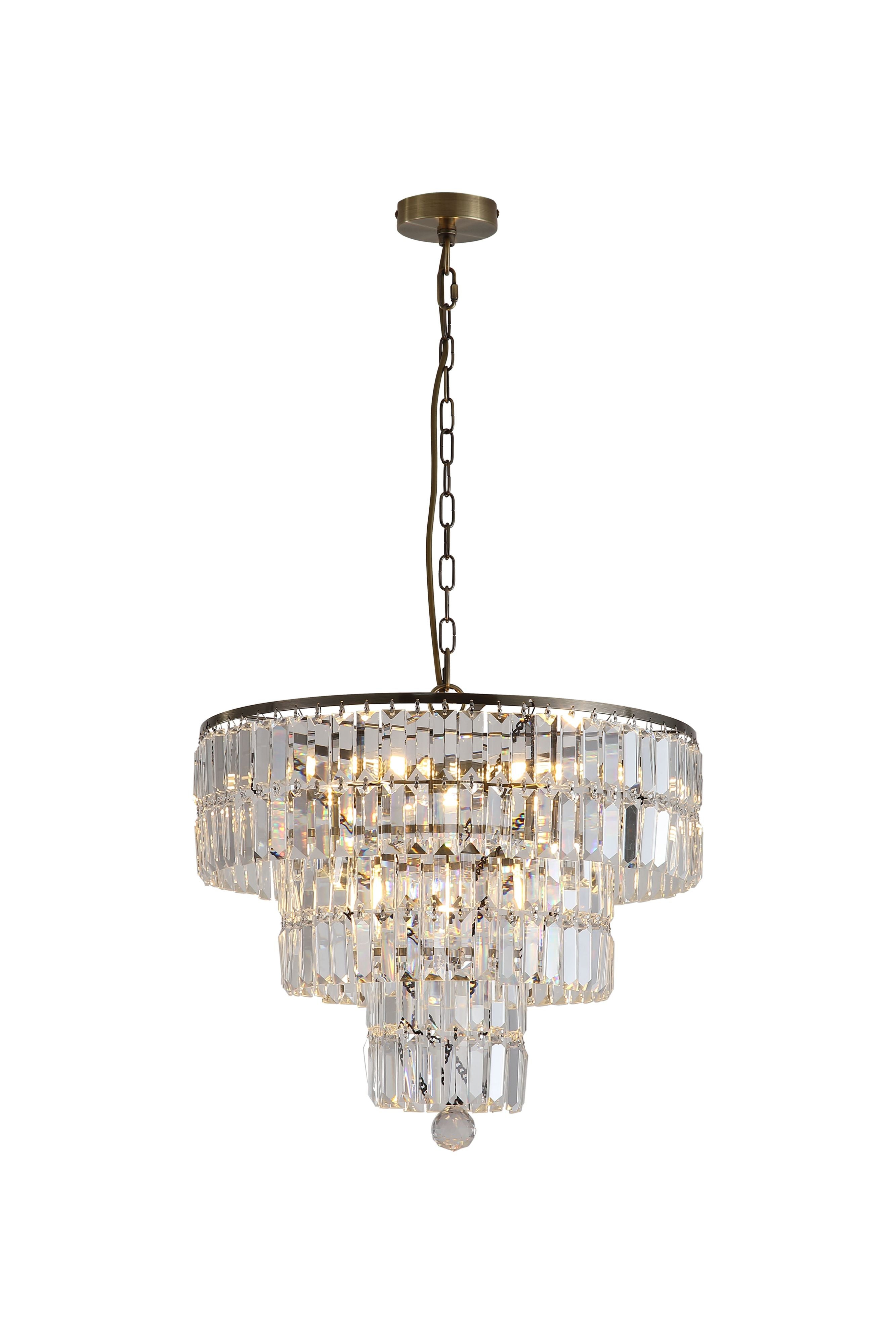 Searchlight Empire 5 Light Pendant in antique brass and clear crystal, lit studio shot showing the full chain and ceiling rose