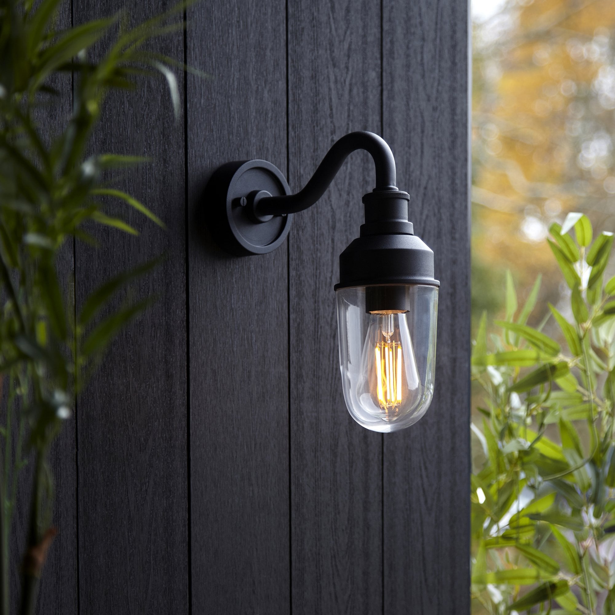 Utopia Frontier Curved Arm Wall Light - Textured Black & Clear Glass