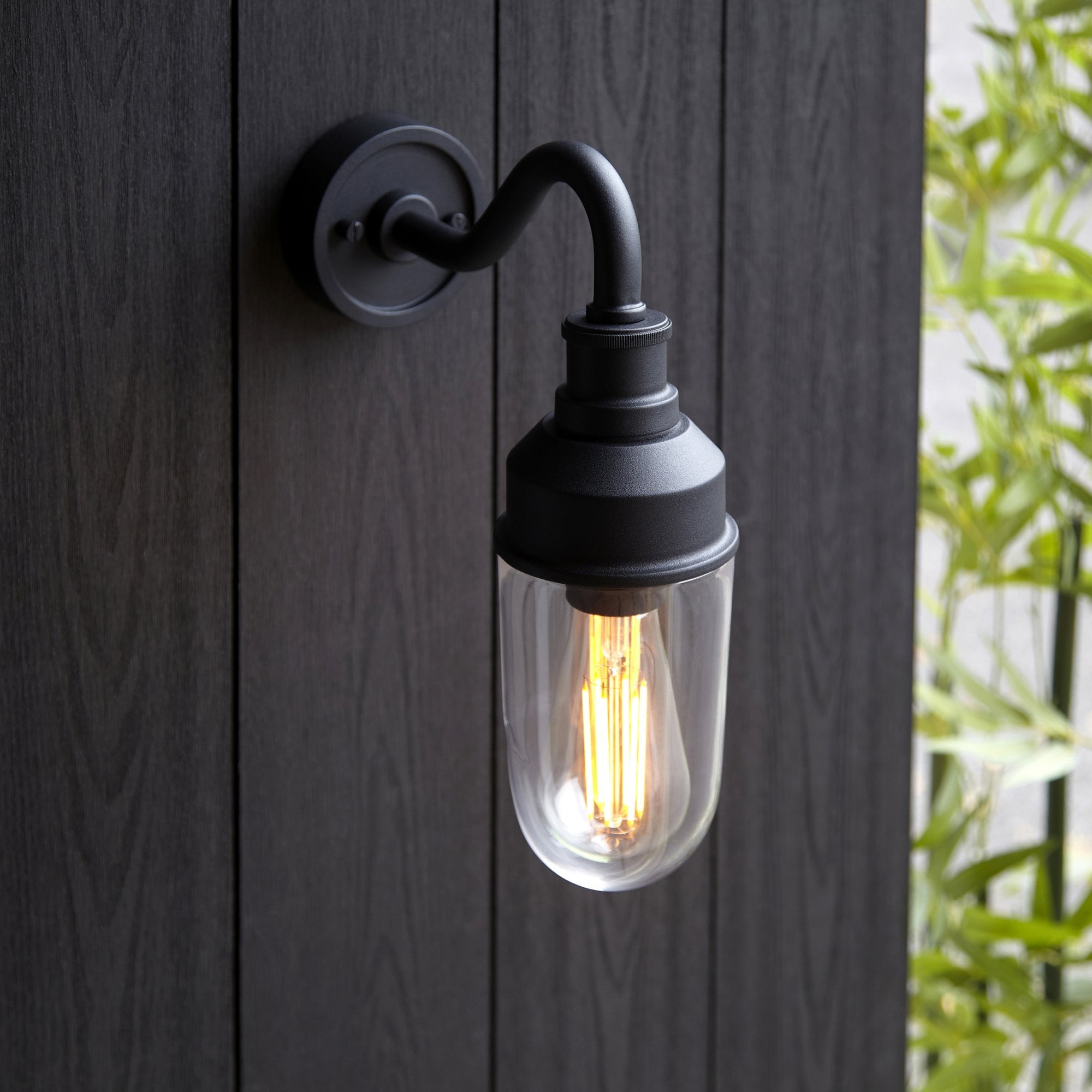 Utopia Frontier Curved Arm Wall Light - Textured Black & Clear Glass