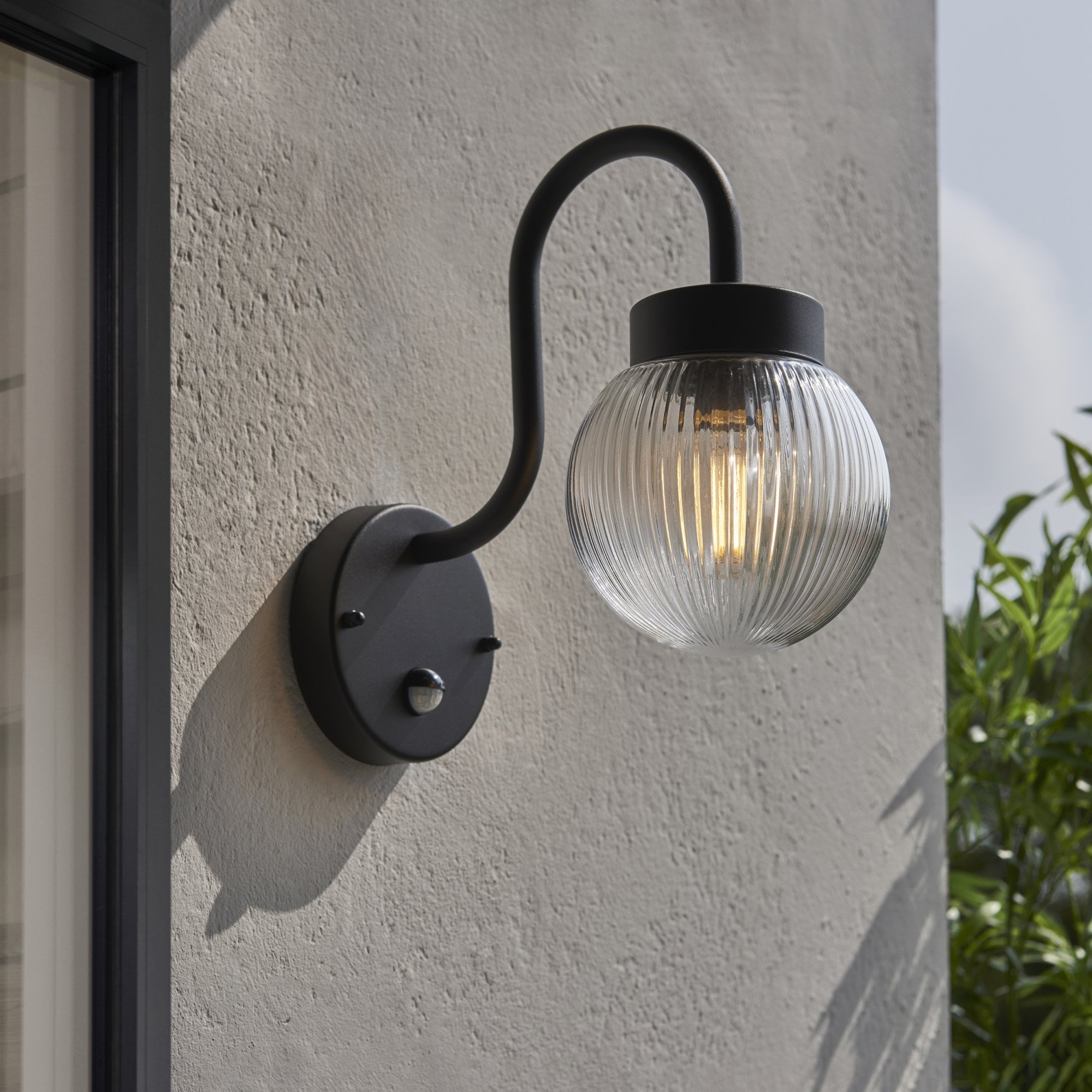 Endon Eldon Single Wall Light with PIR - Textured Black & Clear Ribbed Glass