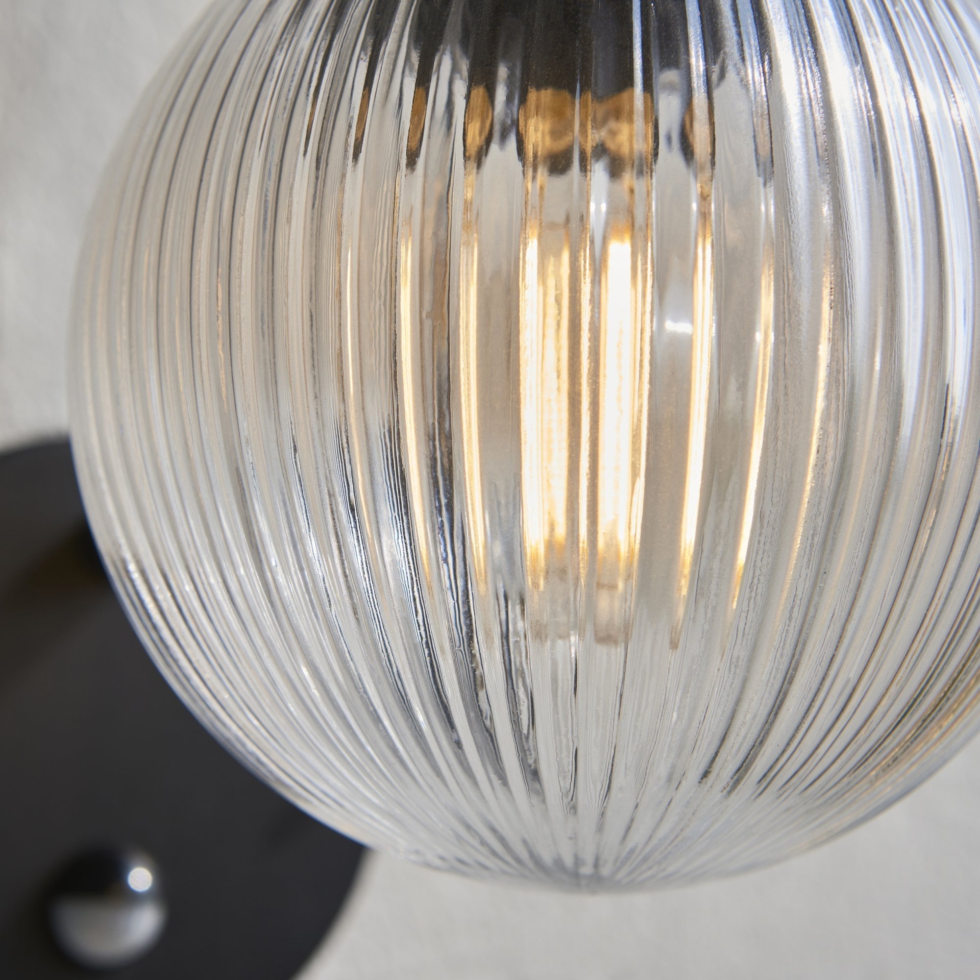 Endon Eldon Single Wall Light with PIR - Textured Black & Clear Ribbed Glass