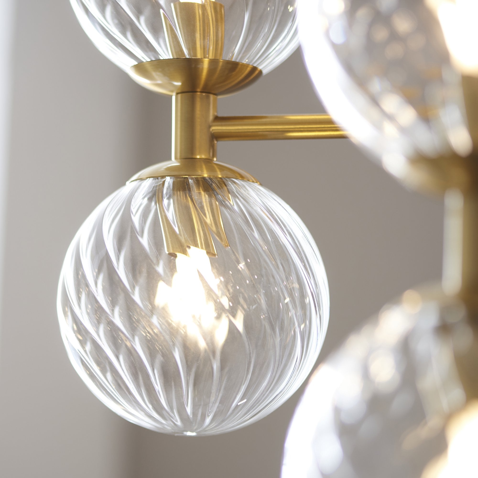 Utopia Atomic 12 Light Pendant - Brushed Aged Brass & Twisted Clear Glass