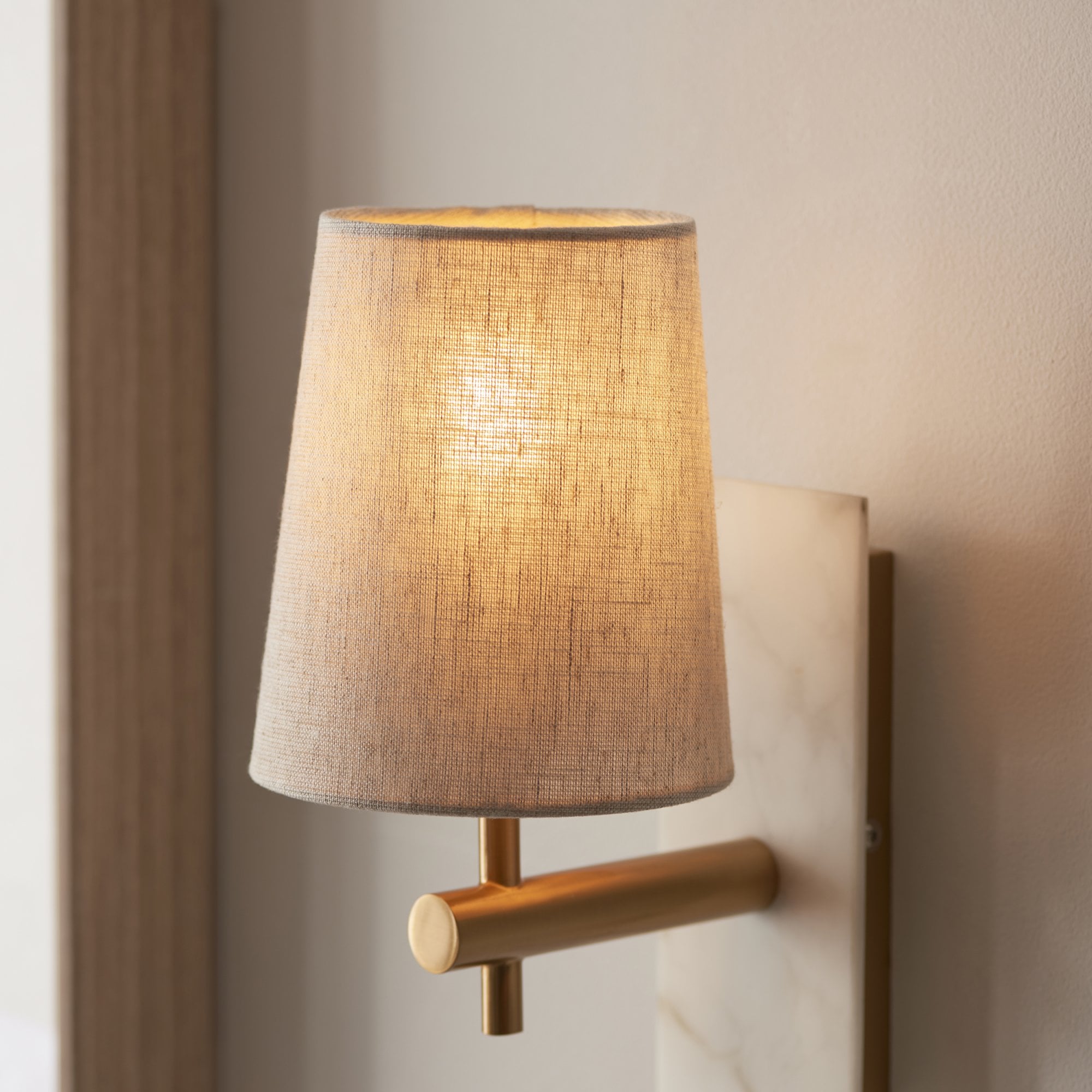 Utopia Spire Single White Marble Wall Light - Vintage Brass & Natural Tapered Shade