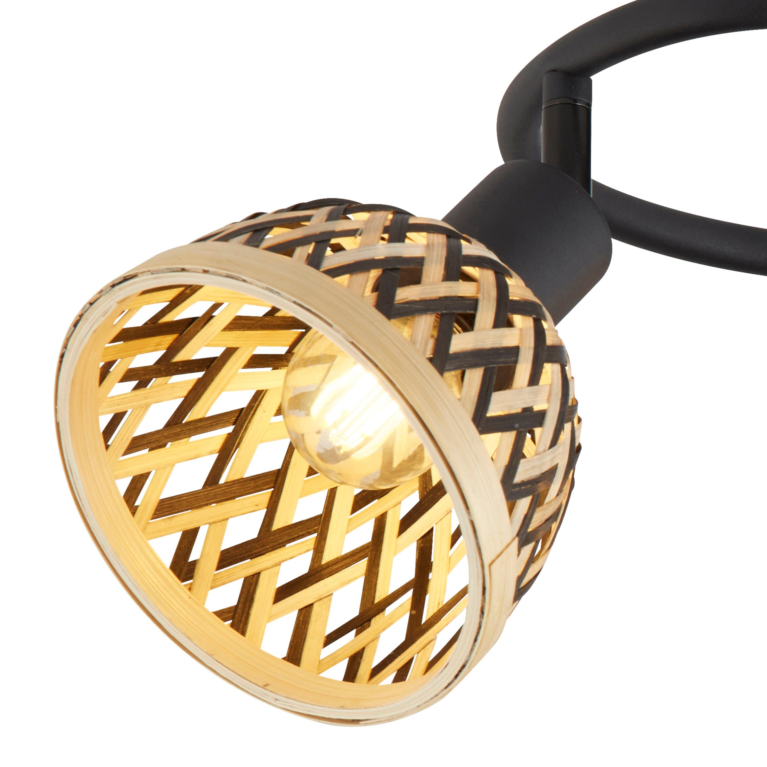 Close up of one Lance round spotlight head showing the woven bamboo shade and bulb