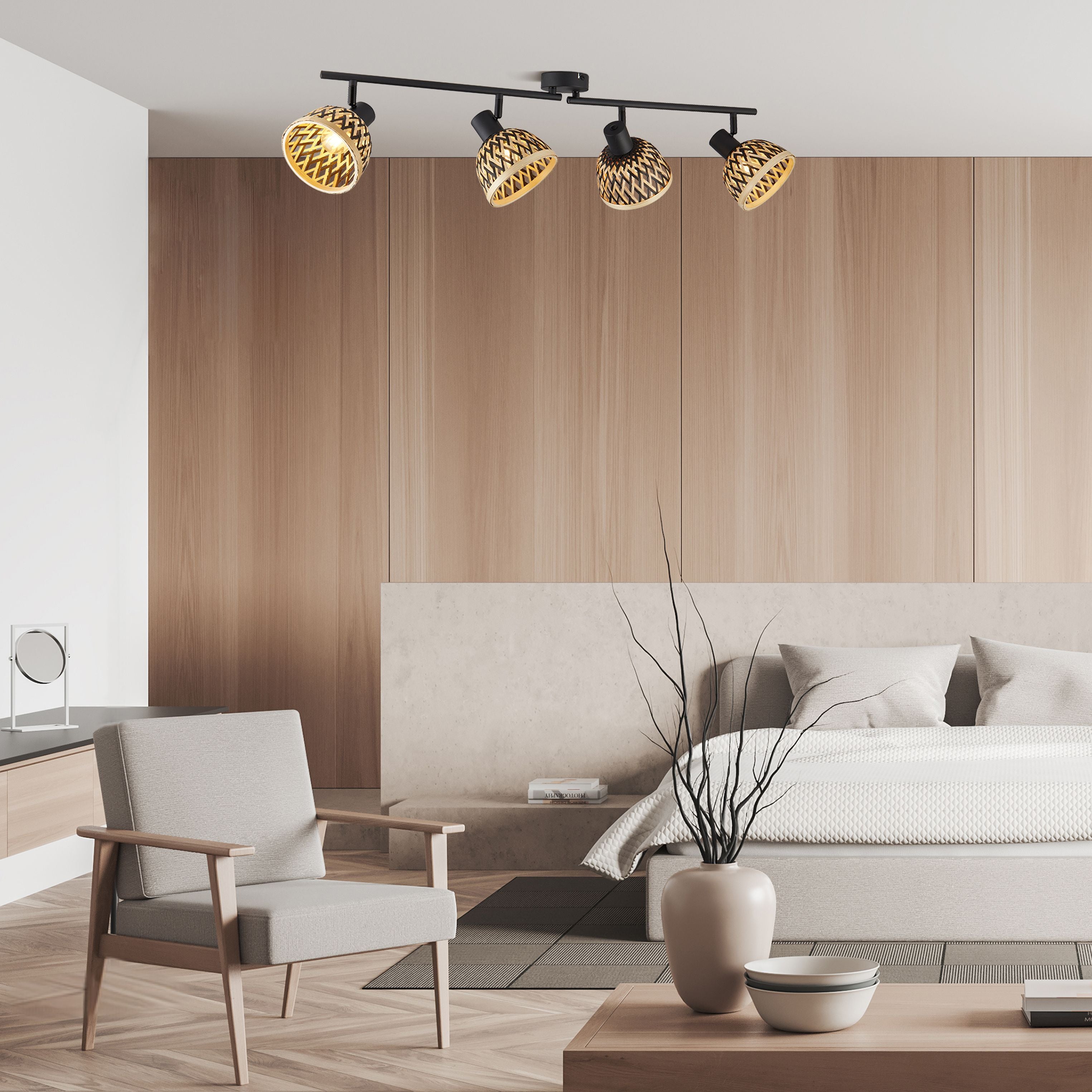 Lance 4 light spotlight bar mounted on a wood panelled ceiling above a bed and armchair