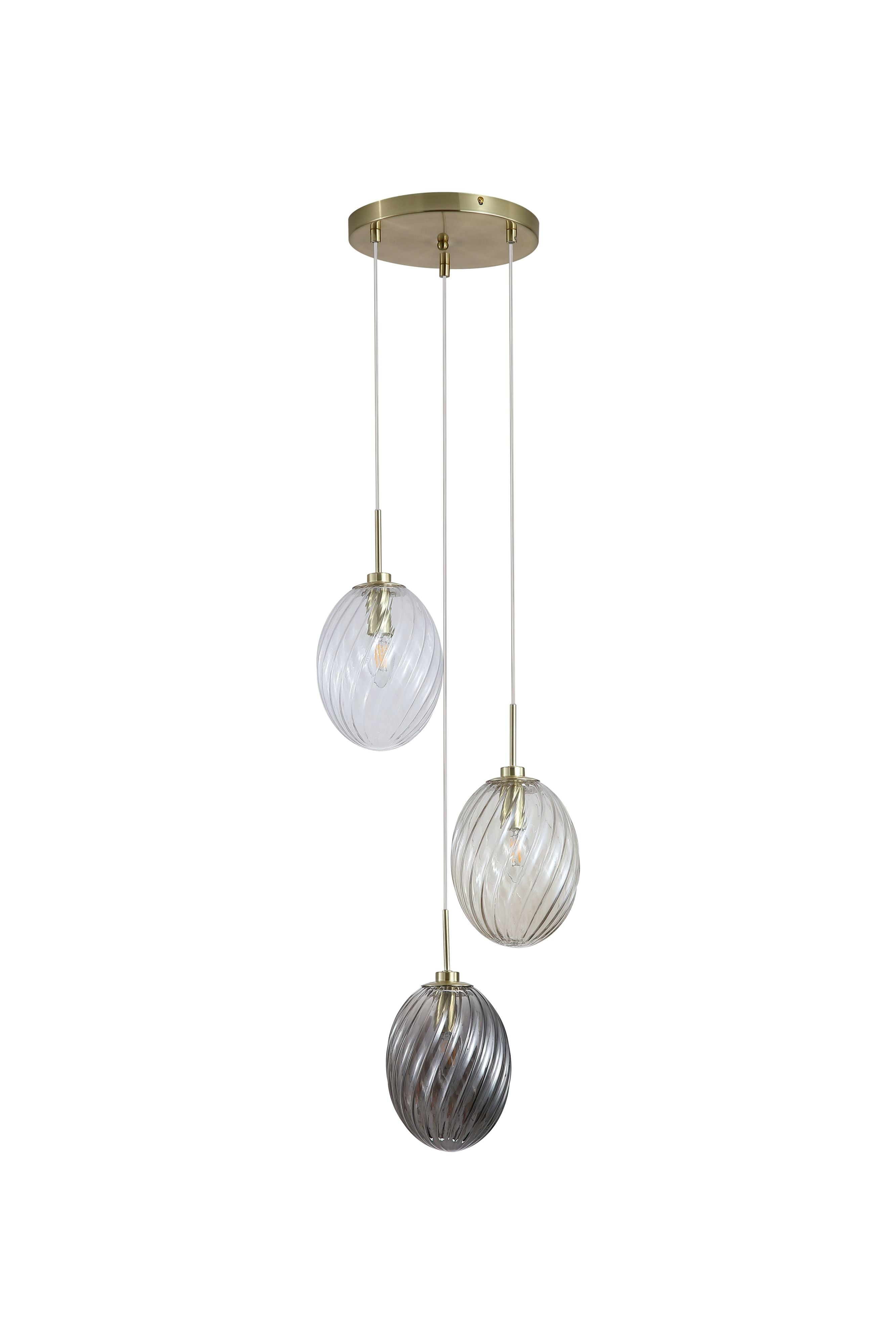 Close up of the Searchlight Whirl multi drop pendant showing the clear and champagne tinted swirled glass shades with lit bulbs, against a soft grey background