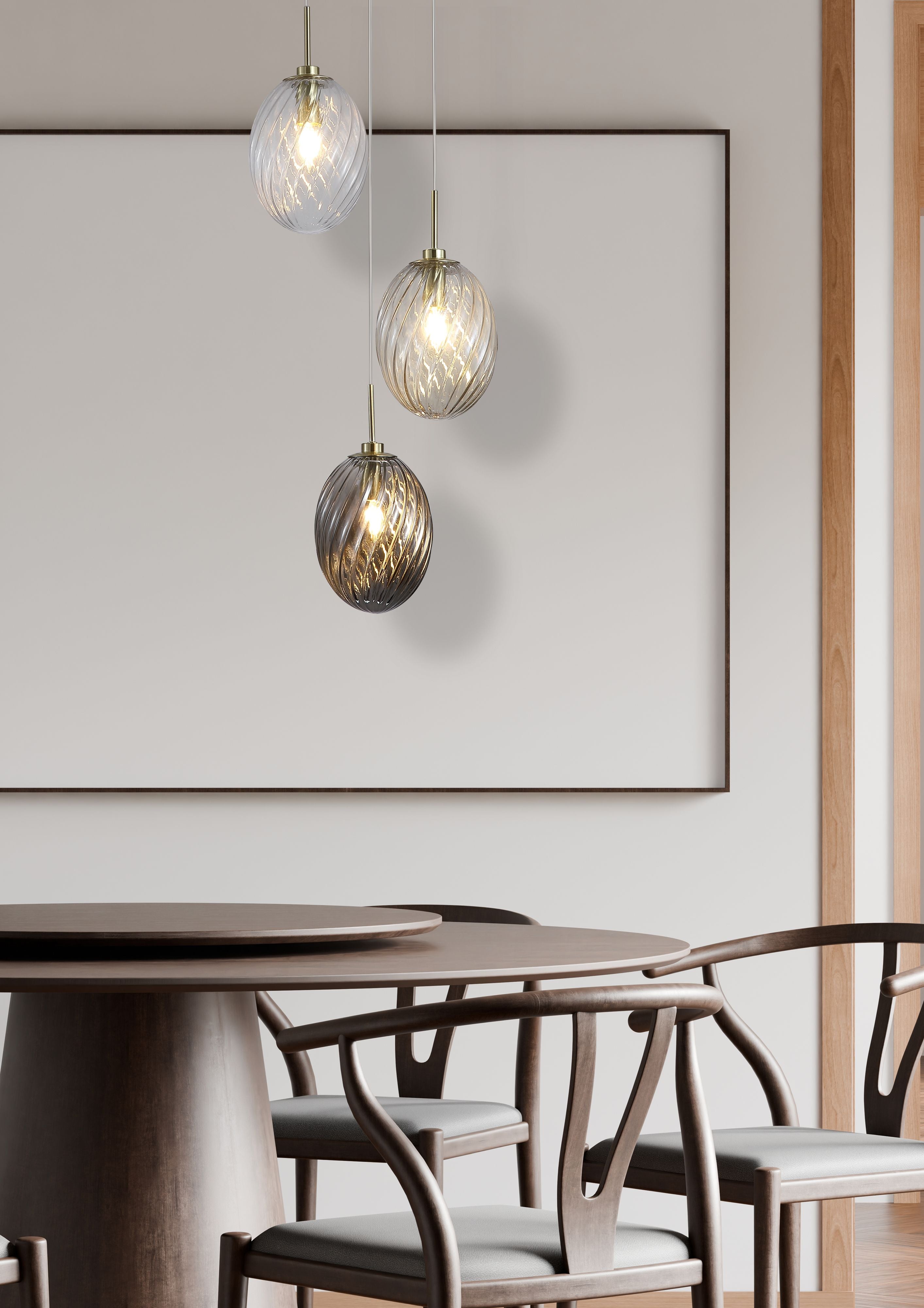 Searchlight Whirl 3 light multi drop pendant with clear, champagne and smoked glass shades hung in a living room with a beige sofa, armchair and round coffee table in front of tall curtained windows