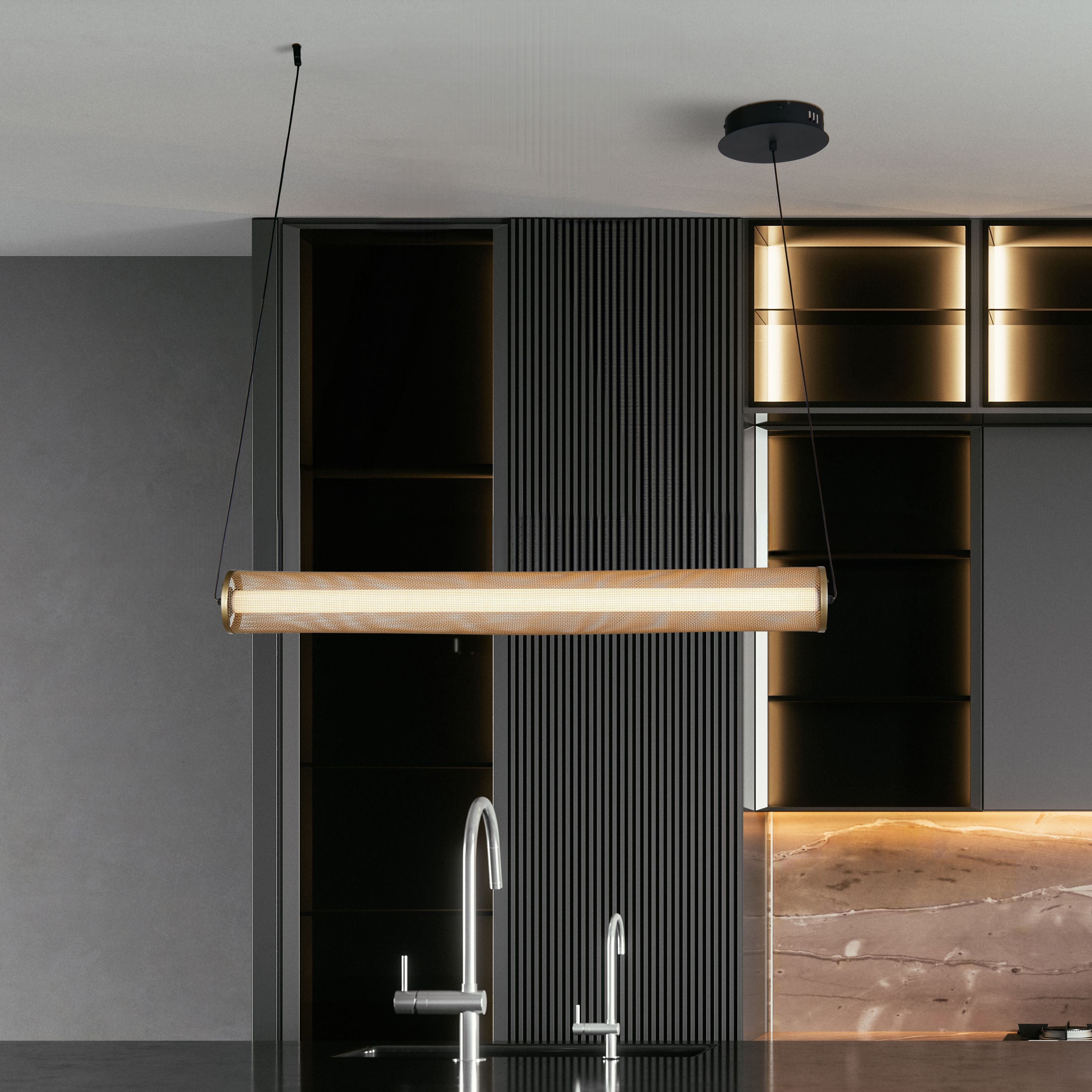 Searchlight Thread LED pendant in gold mesh and matt black, hung horizontally above a kitchen island with marble splashback, lit warm white
