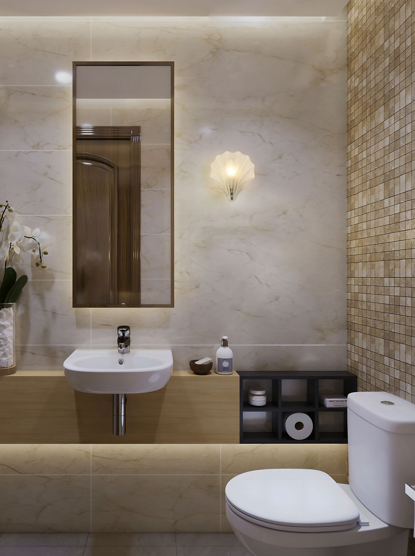 Shell wall light in satin silver with frosted glass mounted beside a bathroom sink and toilet