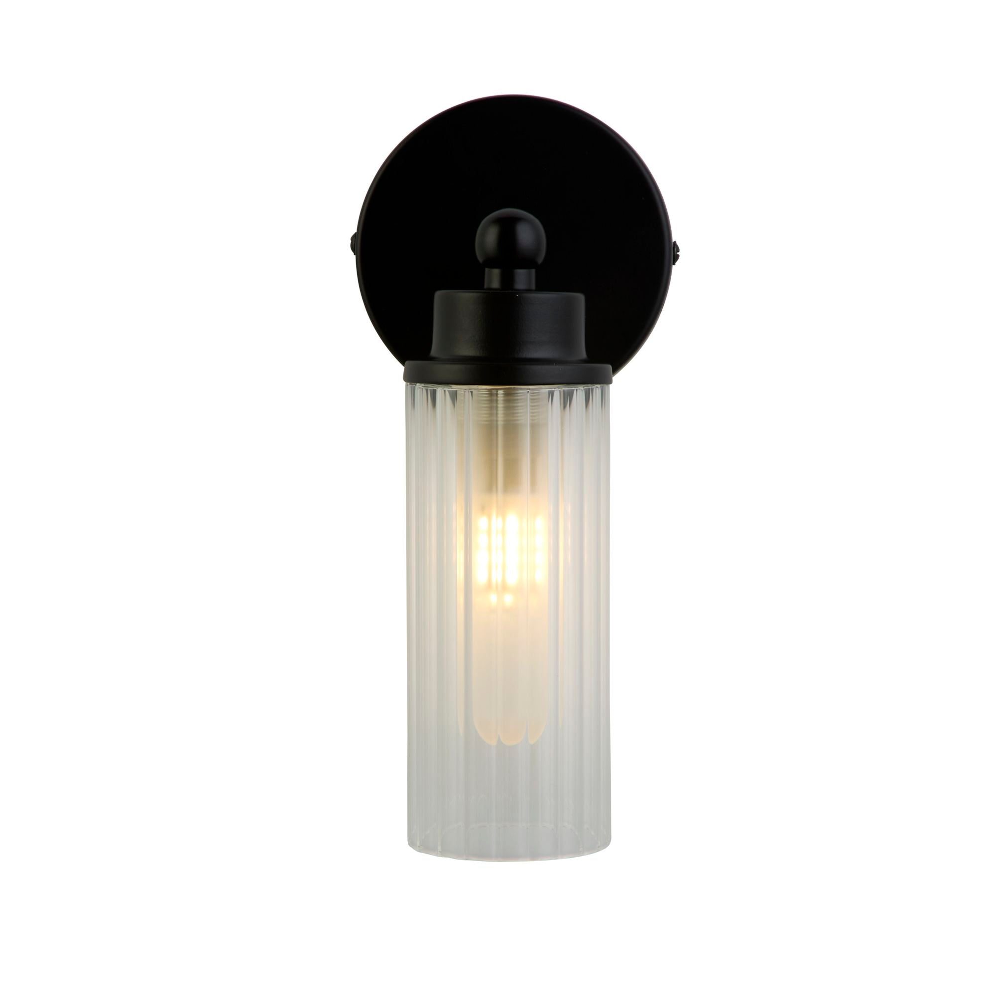 Searchlight Imperial 1 light wall light in matt black with clear ribbed glass shade, lit, straight on studio shot