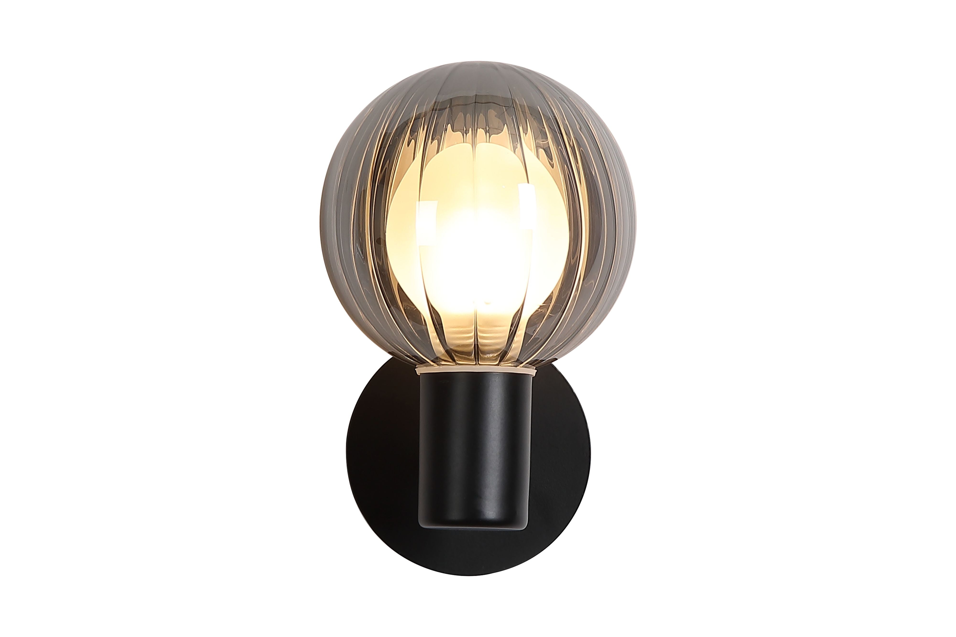 Searchlight Luminsphere wall light in matte black, studio shot of the ribbed smoked glass sphere lit warm white
