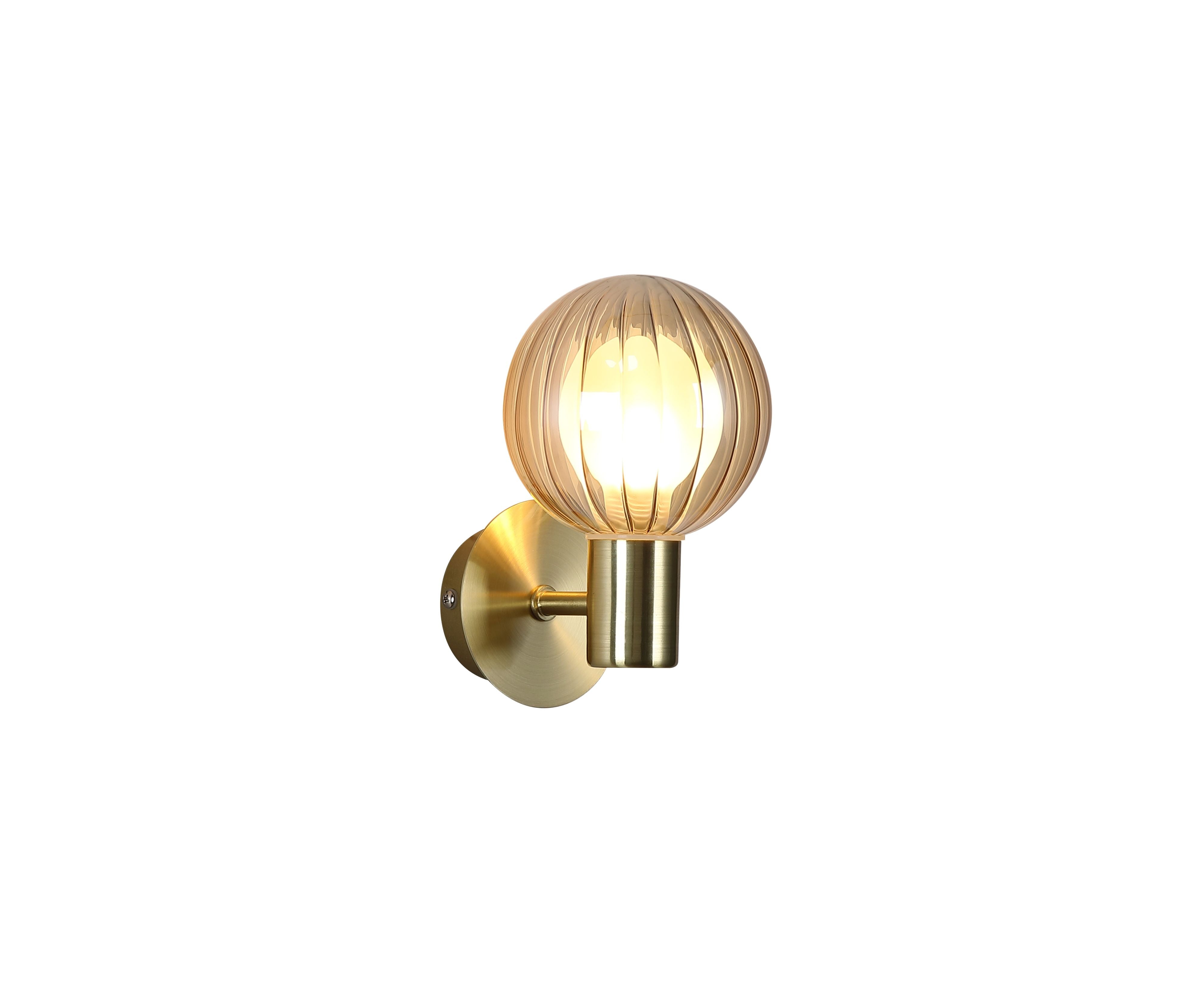 Searchlight Luminsphere 1 Light Wall Light in brushed brass with a ribbed champagne glass globe shade, lit, angled studio shot