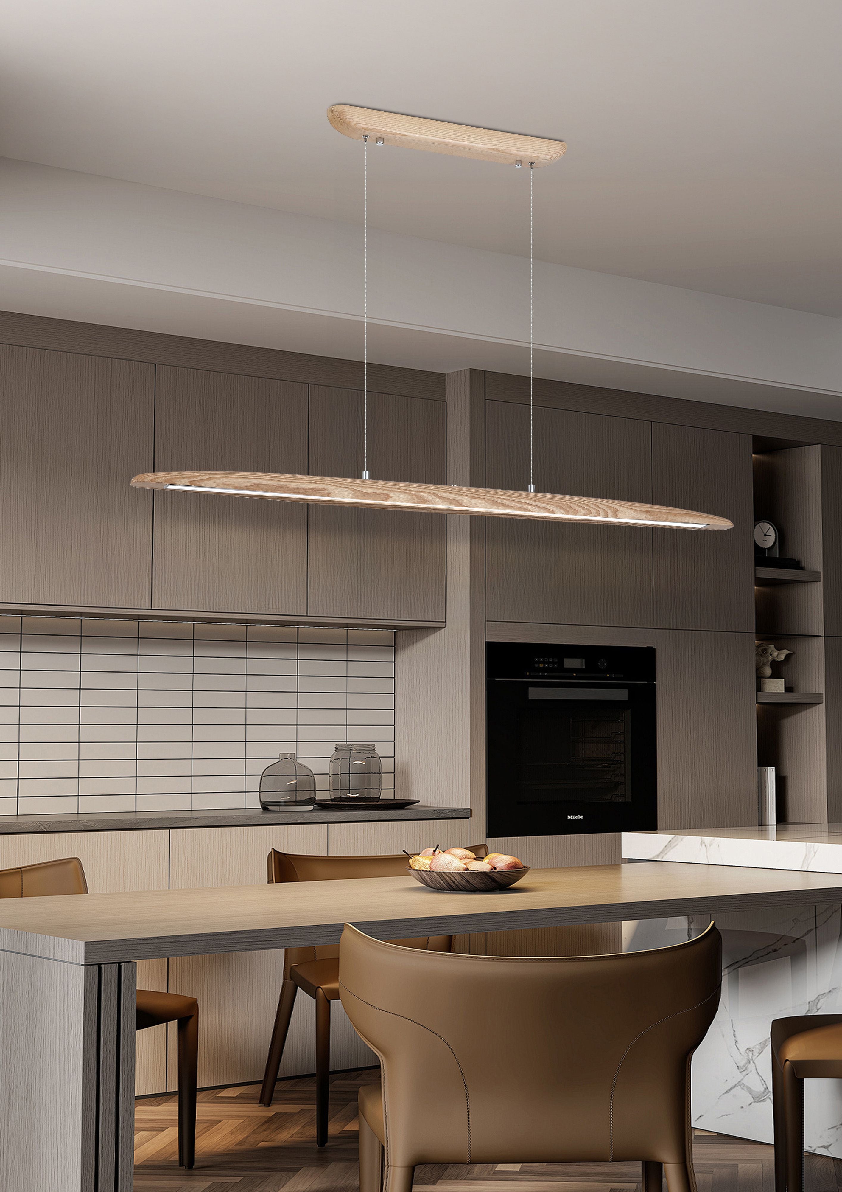 Searchlight Kenzie LED pendant in ash wood styled above a kitchen island with wood cabinetry and leather bar stools
