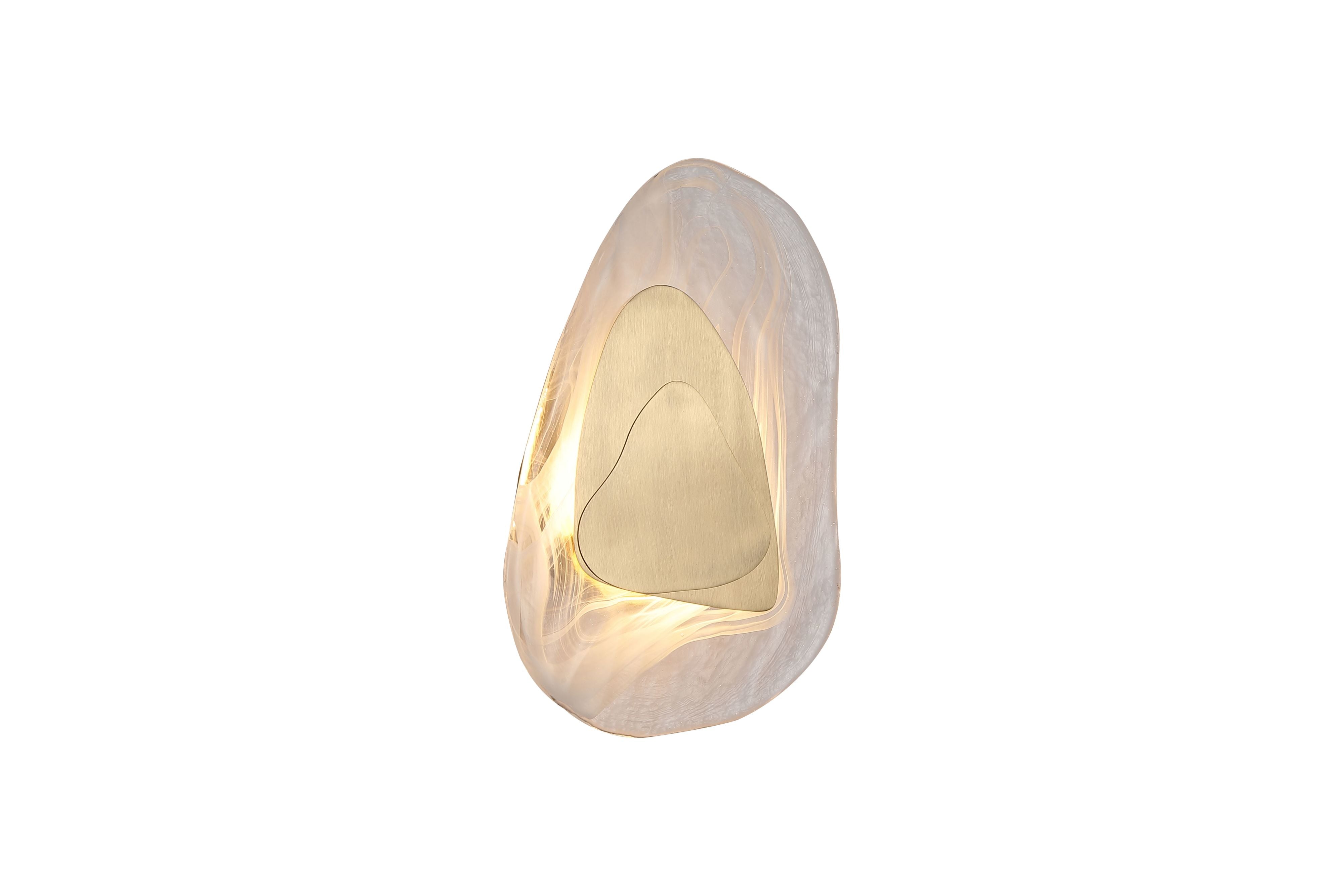 Searchlight Destiny LED wall light in brass, pebble shaped textured glass shade lit from behind with a triangular brushed brass accent plate