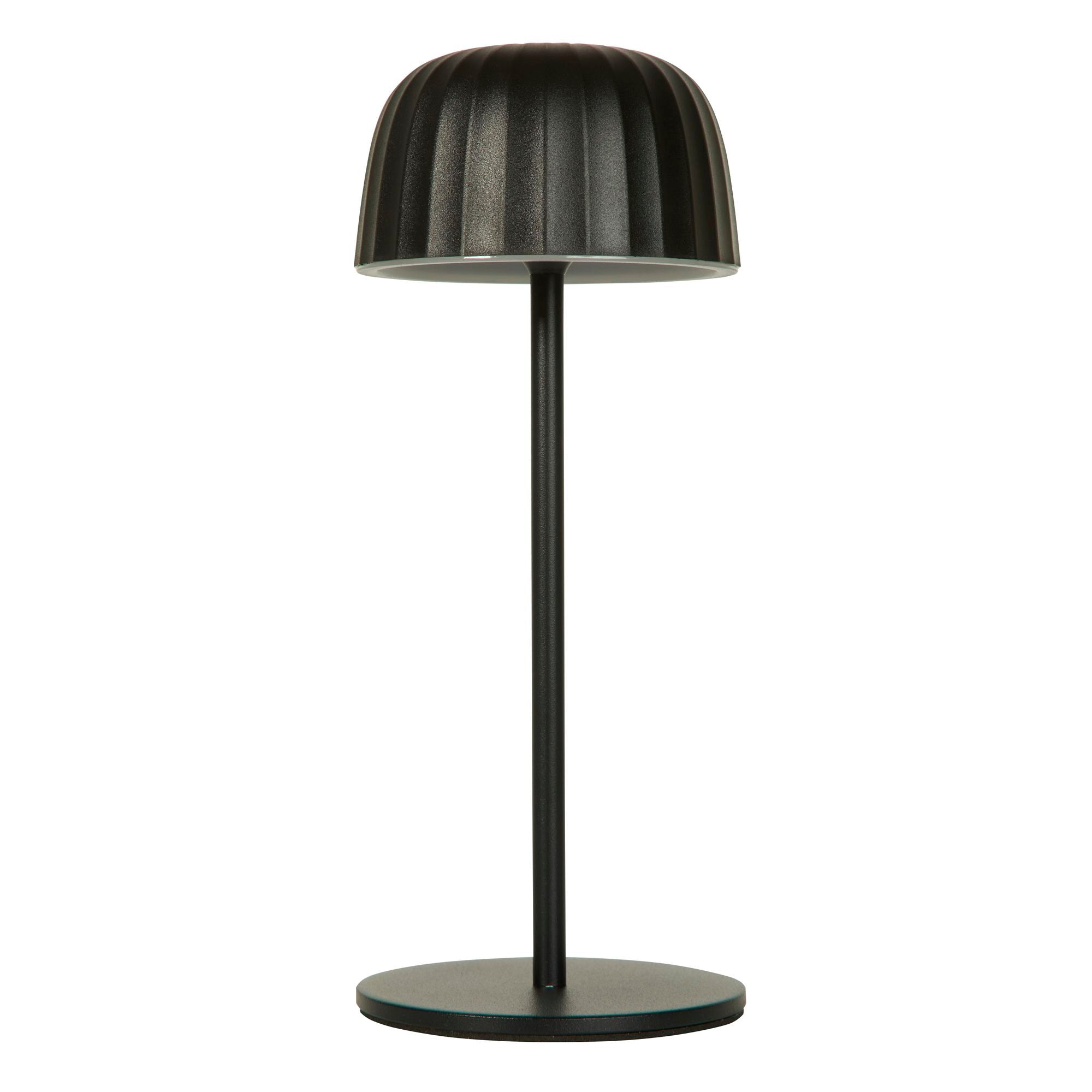 Searchlight Ezra rechargeable table lamp in matt black steel, three quarter angle view on a white background with the ribbed dome shade lit