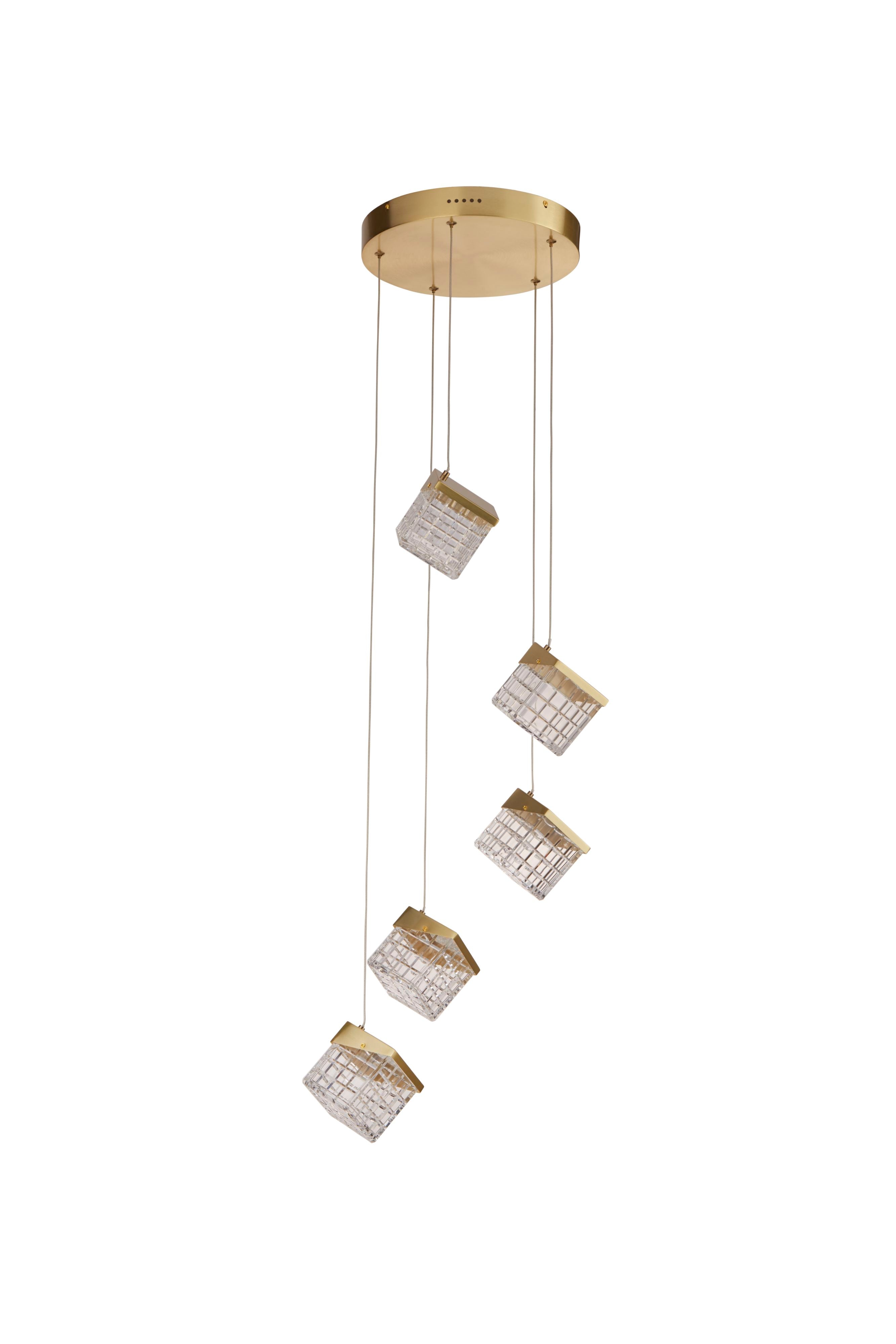 Searchlight Cuboid 5 Light LED Multi Drop Pendant in satin brass, full fitting on a white background, front view of the five staggered lit acrylic cube shades