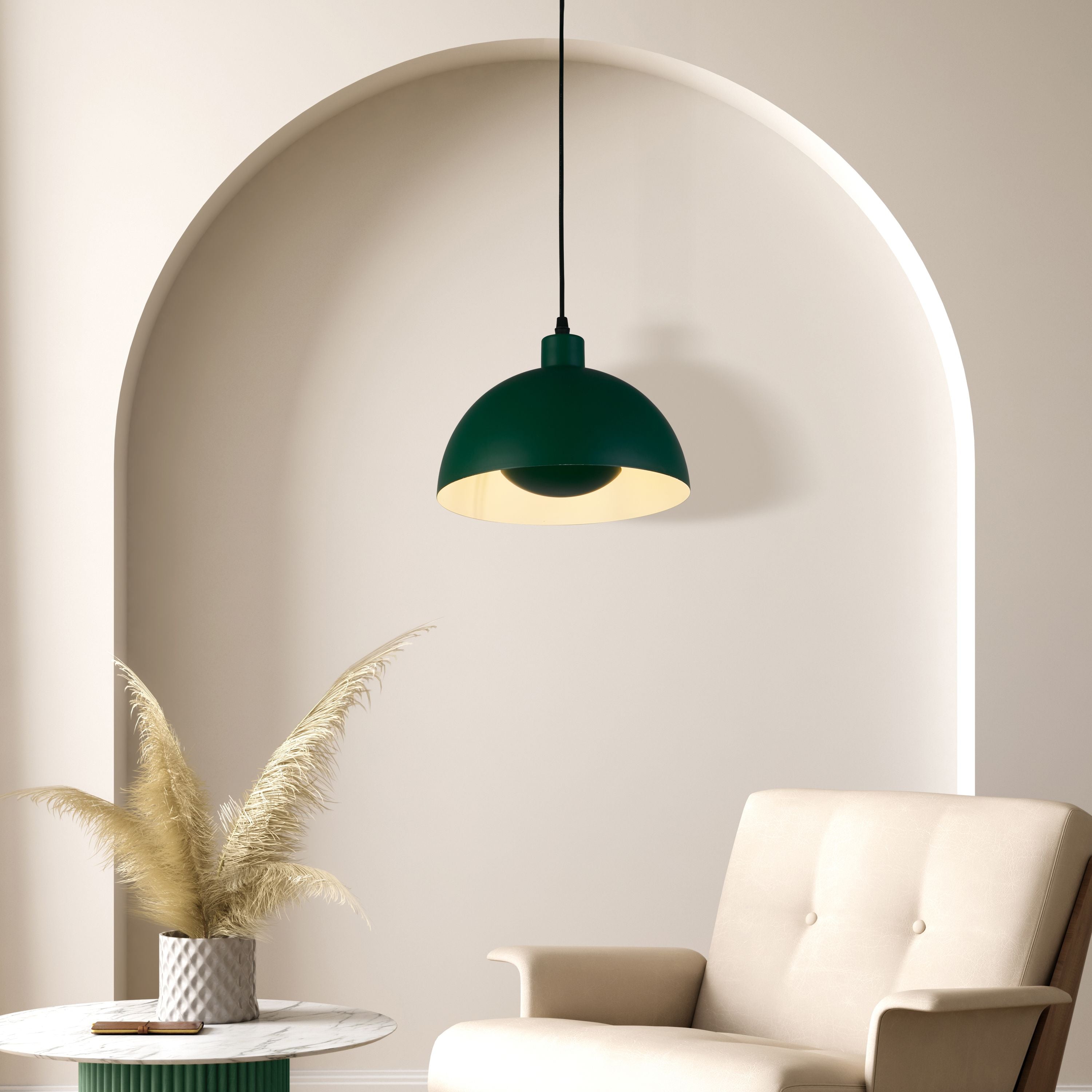 Matt green Mars pendant styled in an arched alcove above a beige armchair, cream interior lit
