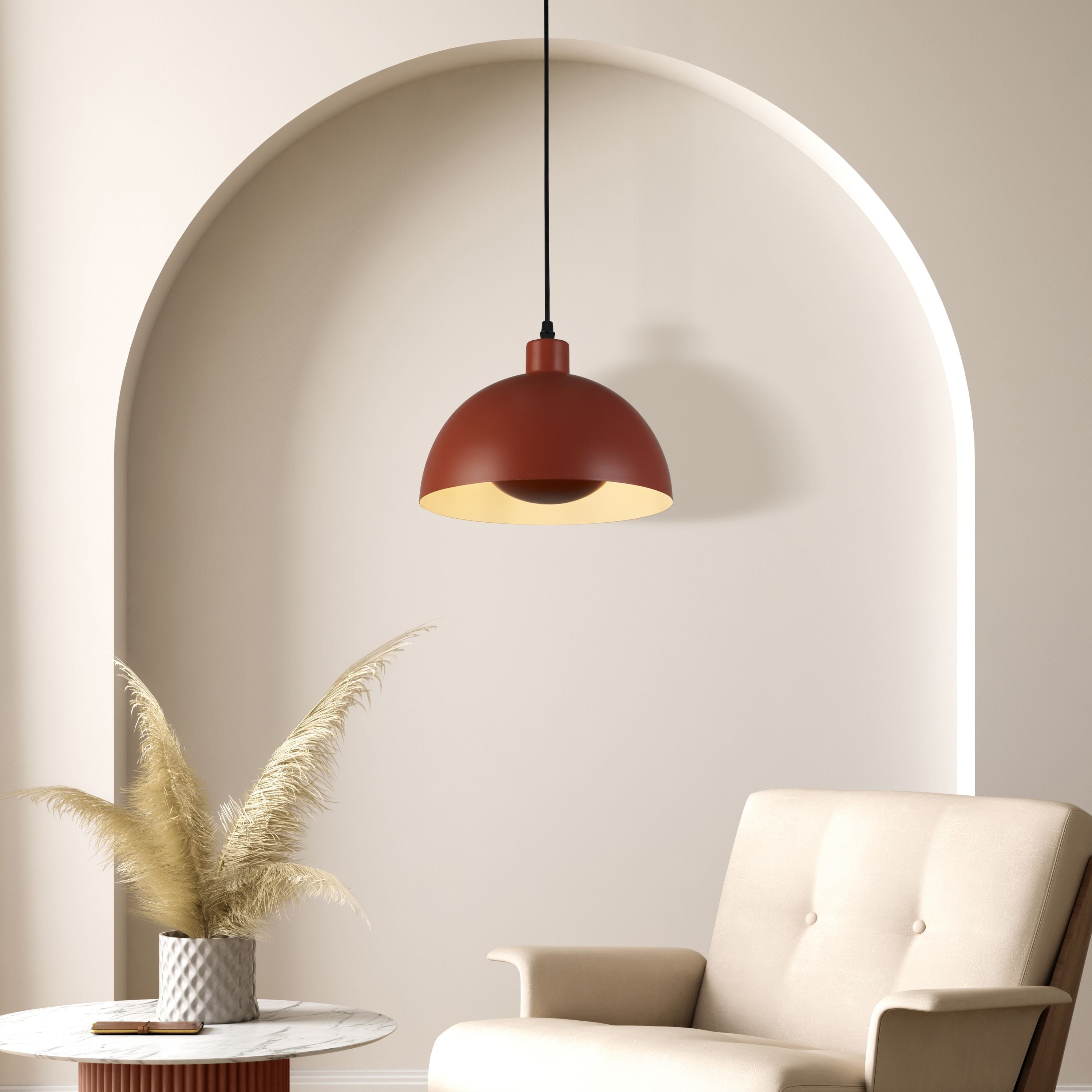 Burnt orange Mars pendant styled in an arched alcove above a beige armchair, cream interior lit