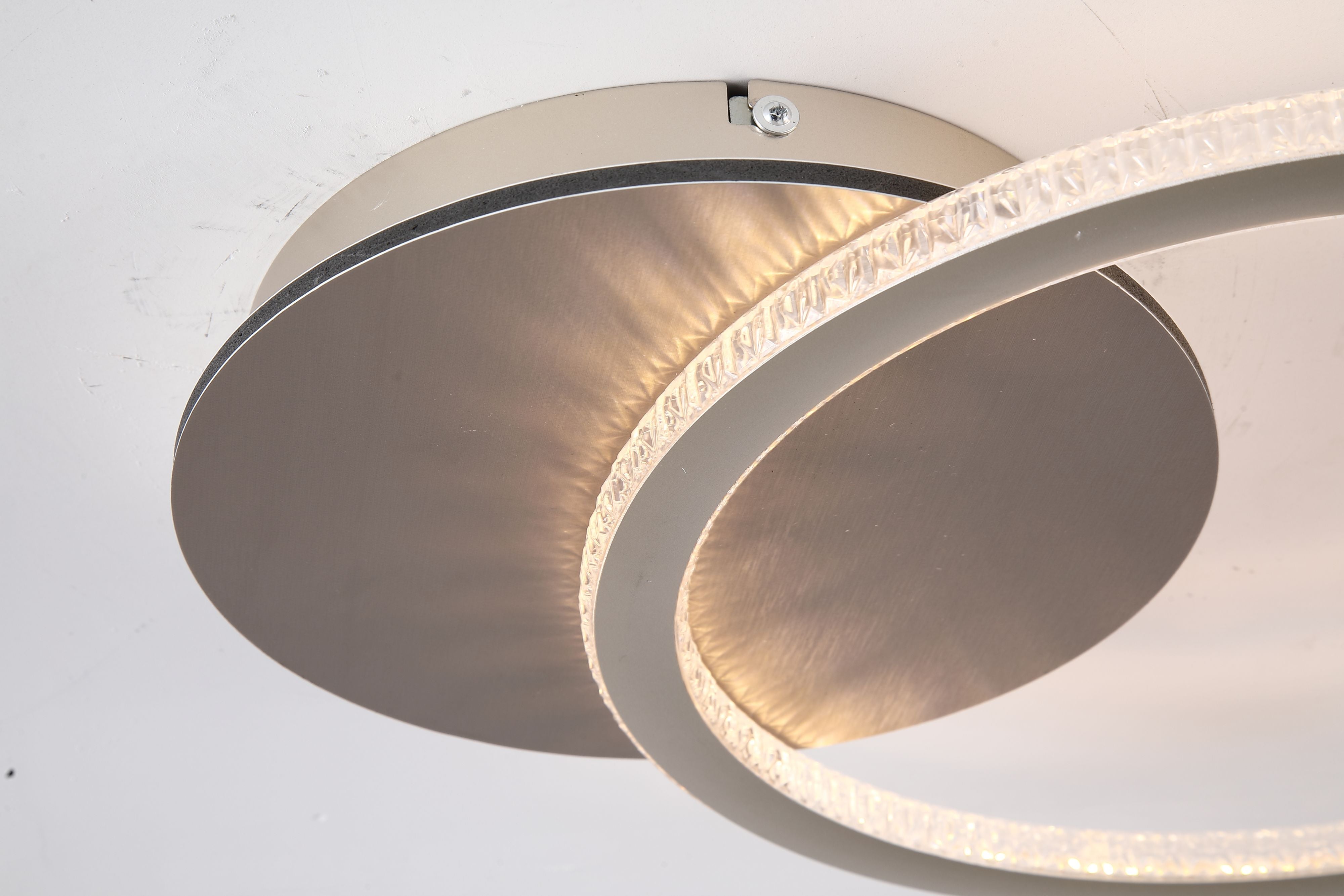 Close up detail of the Specs ring's textured edge and champagne metal backplate