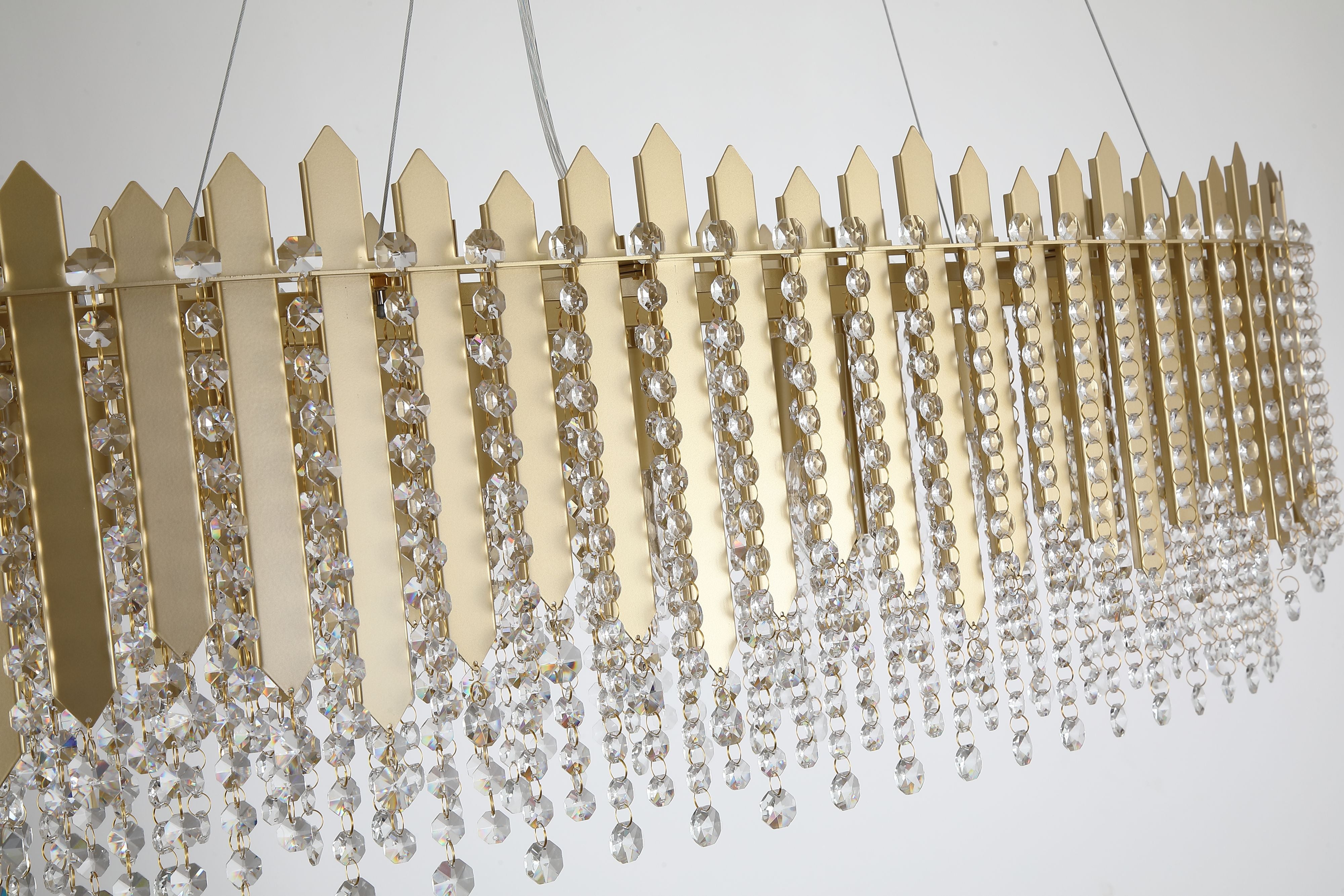 Close up angled detail of the Searchlight Spear 8 Light Diner Bar Pendant showing the gold panel texture and faceted crystal octagon beads