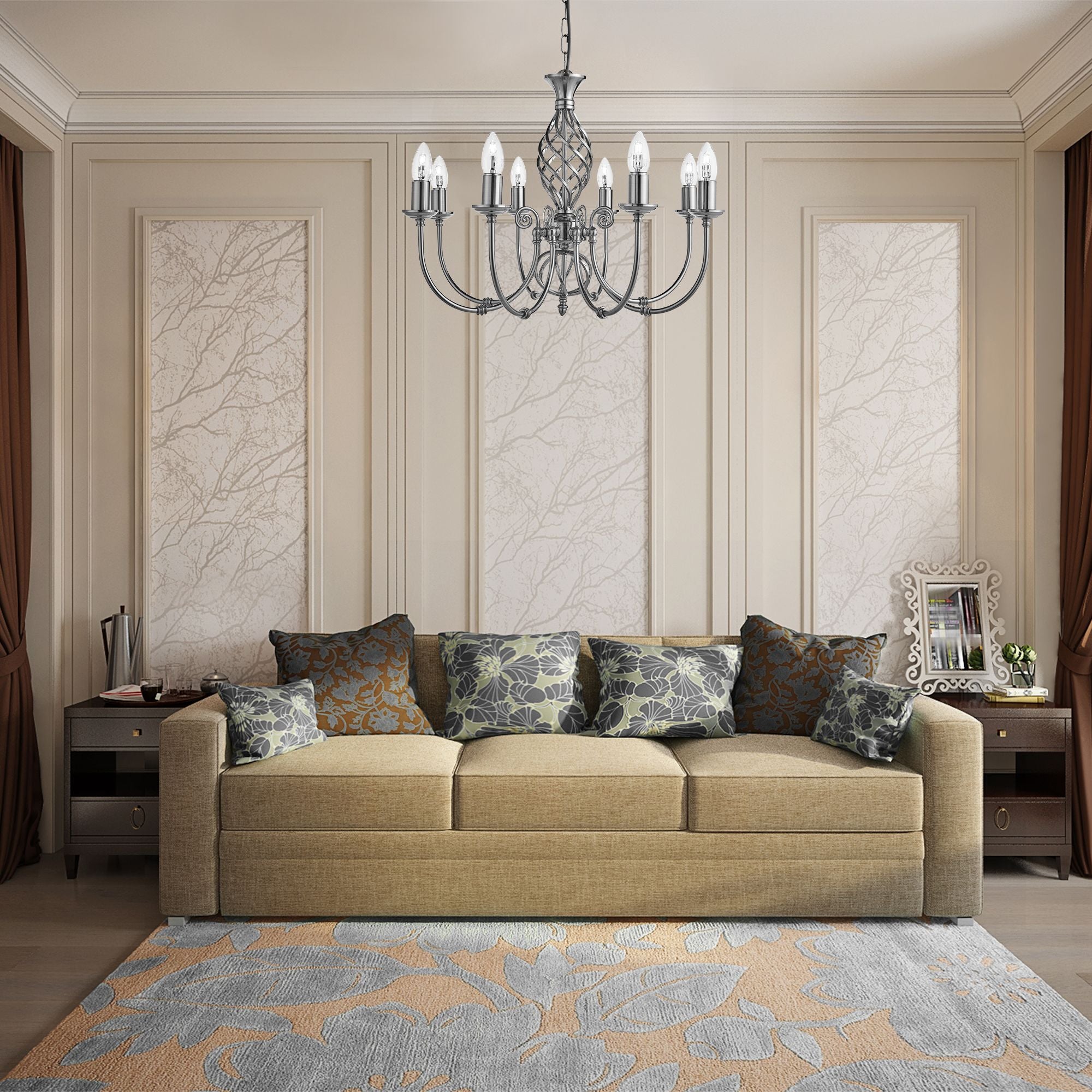 Searchlight Zanzibar 8 Light Pendant in satin silver styled above a beige sofa with patterned cushions in a living room