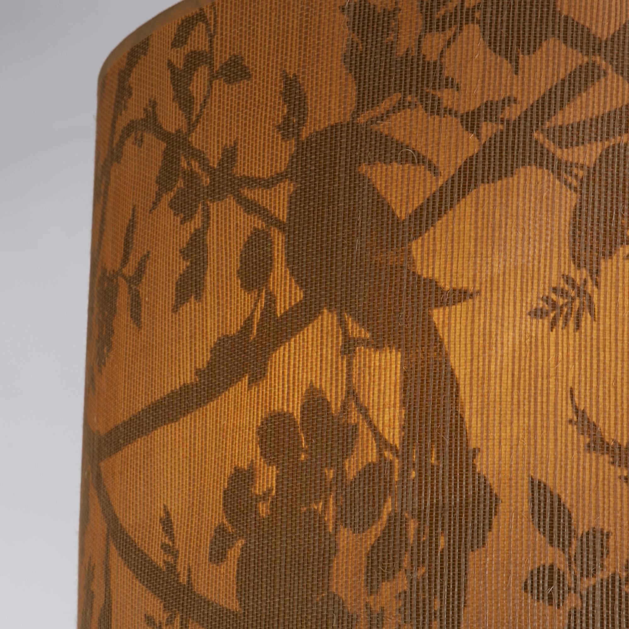 Close up of the leaf and branch print on the Searchlight Isla pendant paper shade