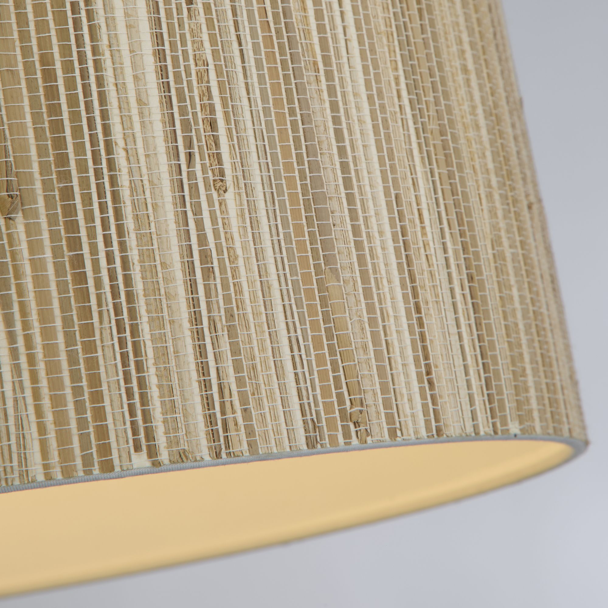 Close up of the natural grass weave on the Searchlight Meadow pendant shade