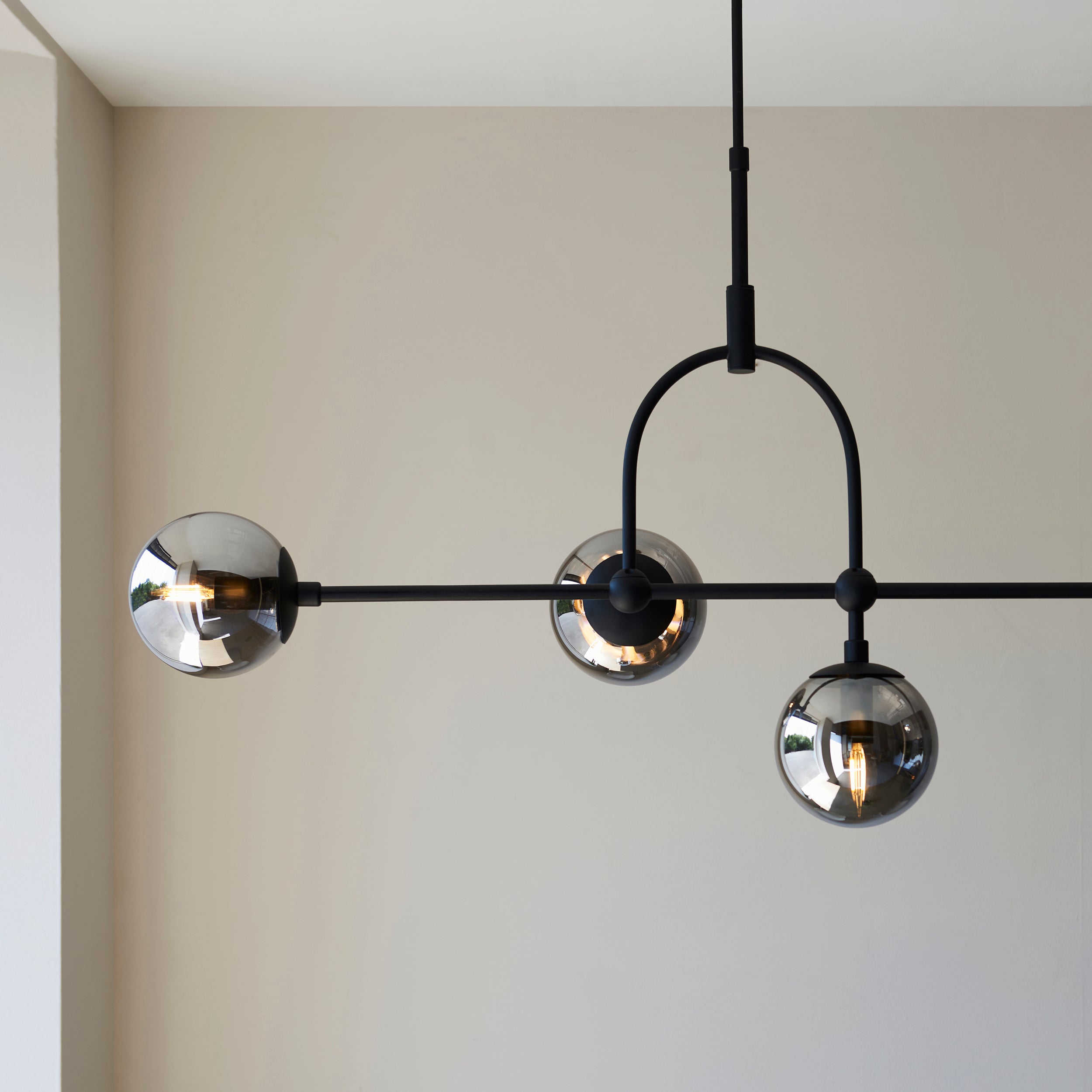 Utopia Sphere 5 Light Linear Pendant - Matt Black & Smoked Mirror Glass