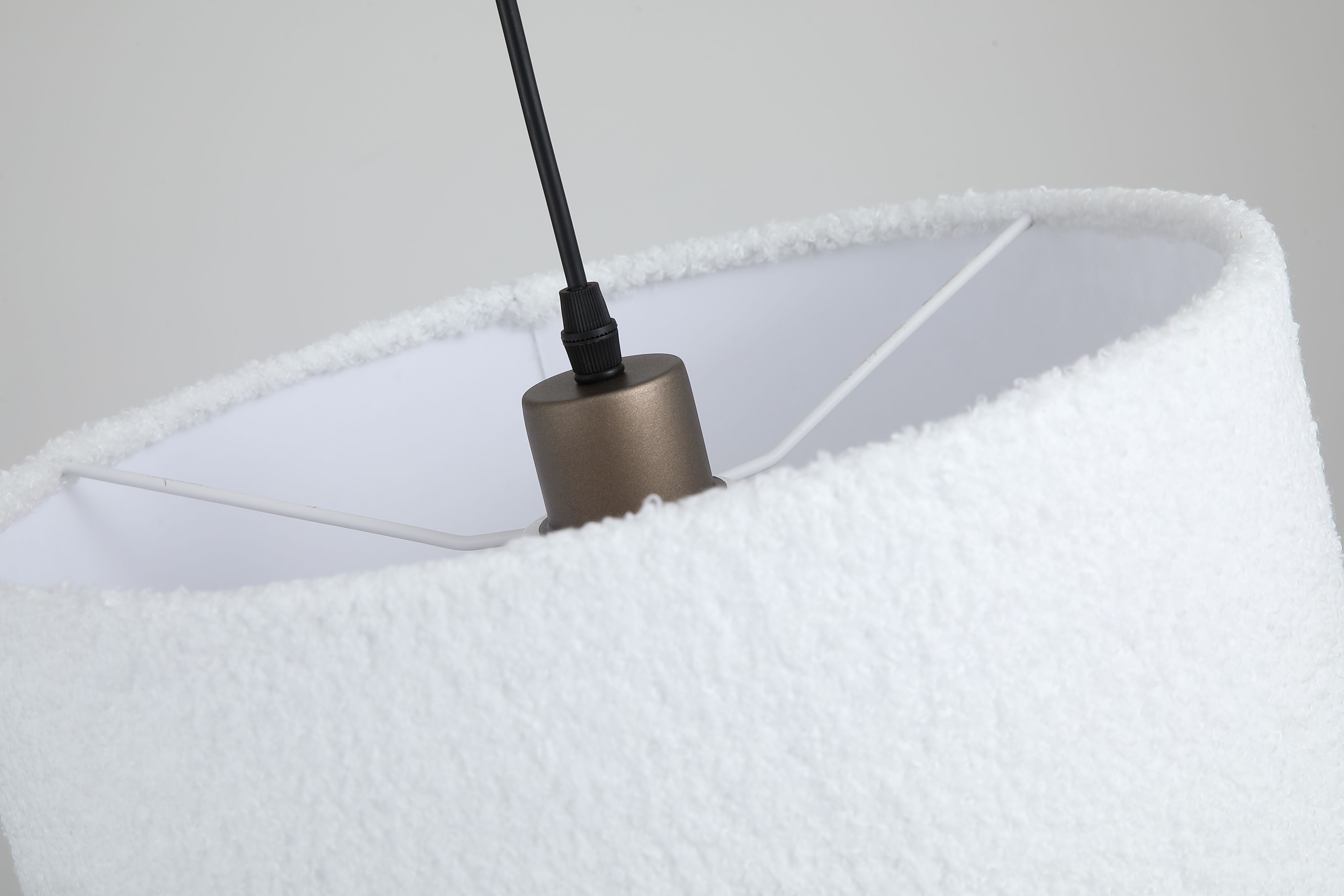 Close up looking up into the underside of the Chelsea pendant shade, showing the lampholder and cross support