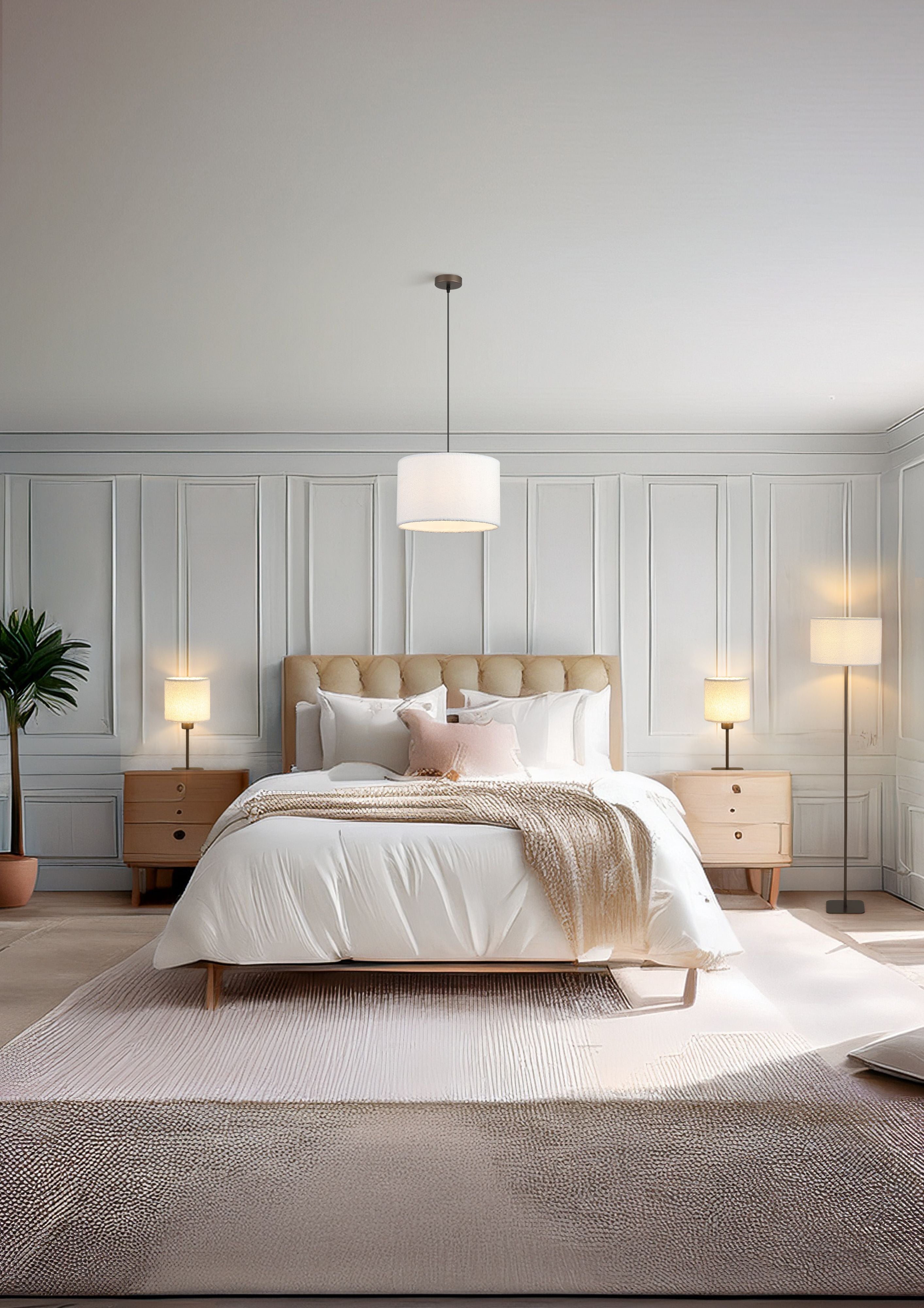 Chelsea pendant styled above a bed, lit alongside matching Chelsea table lamps and a floor lamp in a bedroom
